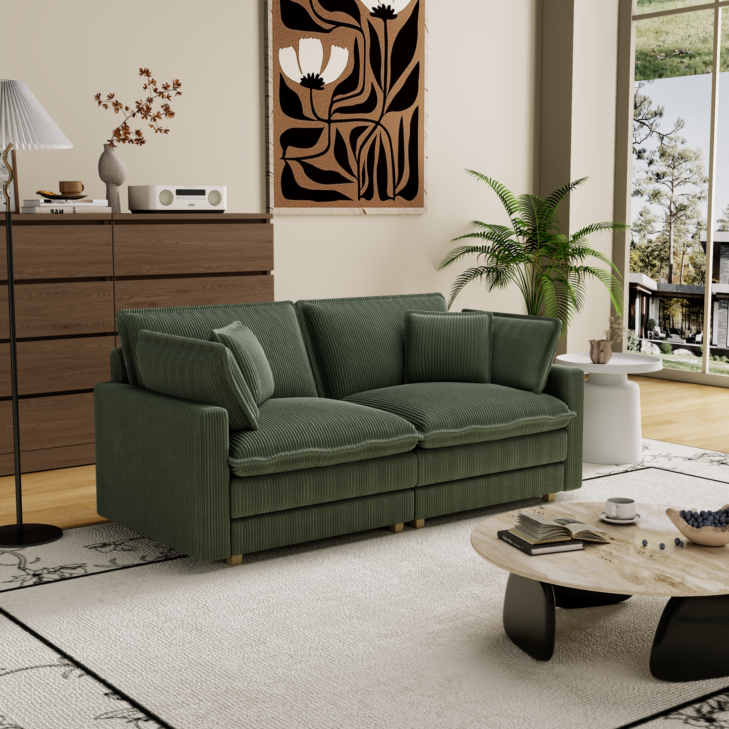 Deep green corduroy sofa with plush cushions and gold accents for a cozy living room