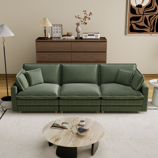 Sage green corduroy sectional sofa with plush cushions