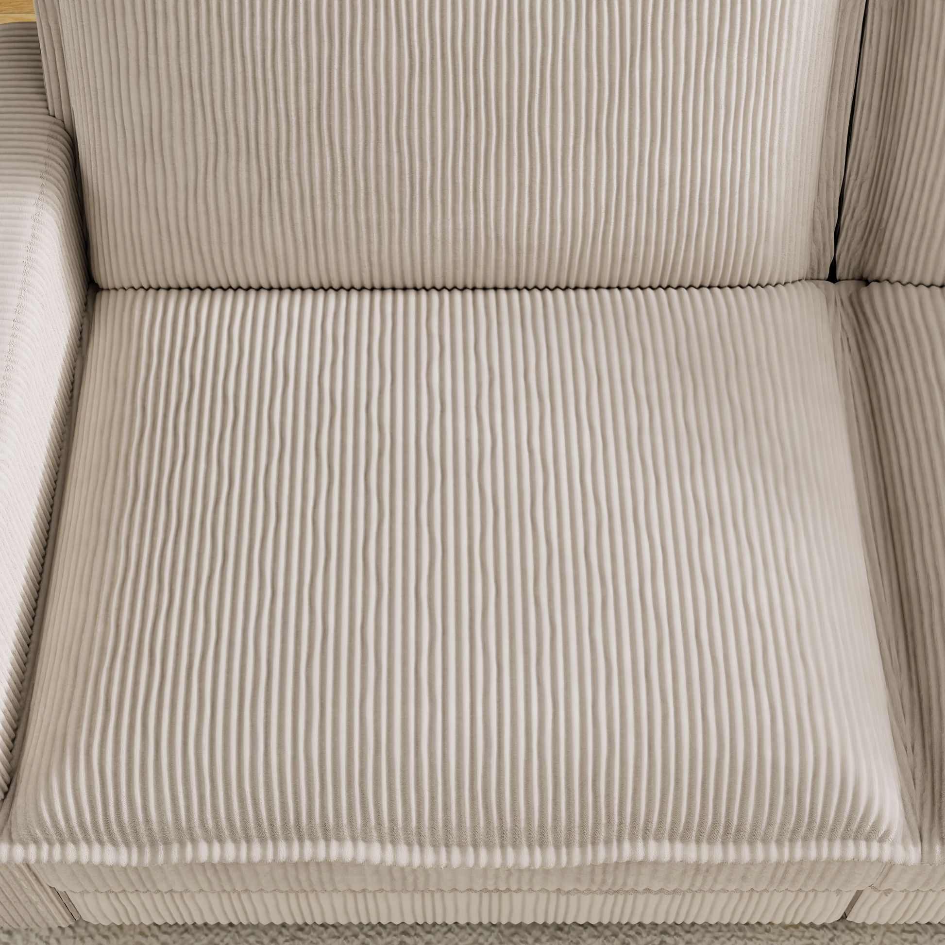 Cream corduroy sofa cushion with vertical ribbed texture and plush feel