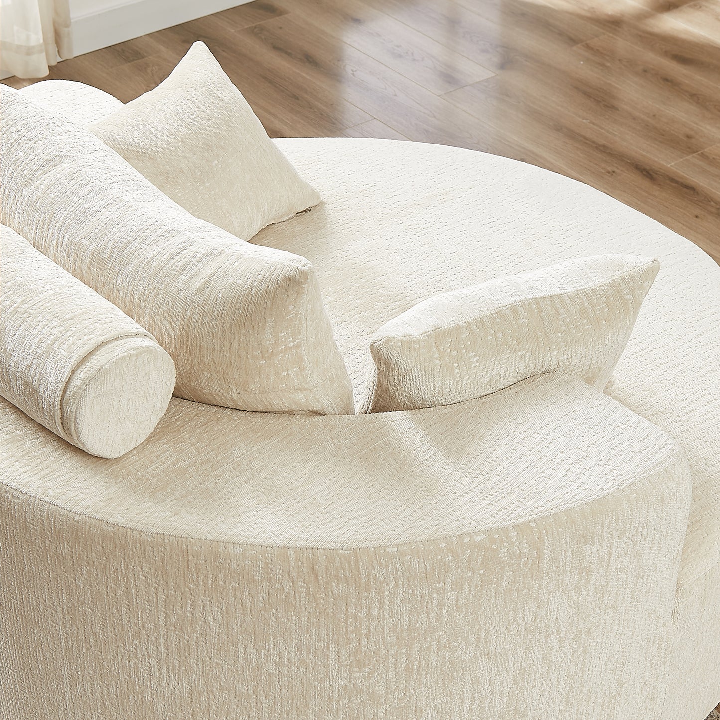 Cream textured circular sofa with plush cushions modern living room furniture