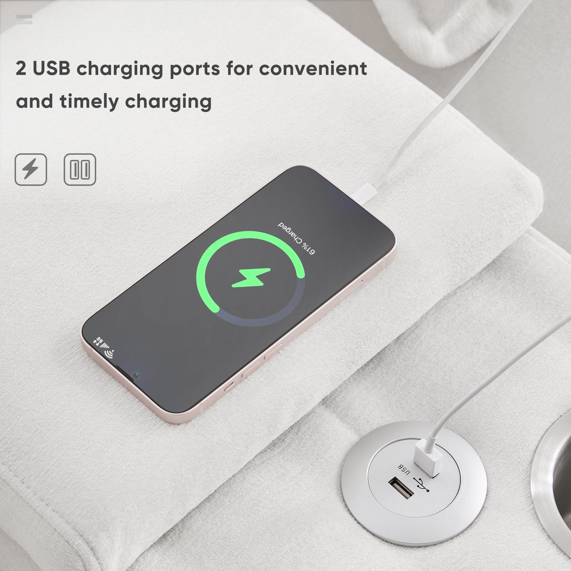 Silver USB charging port on a textured white surface powering a smartphone