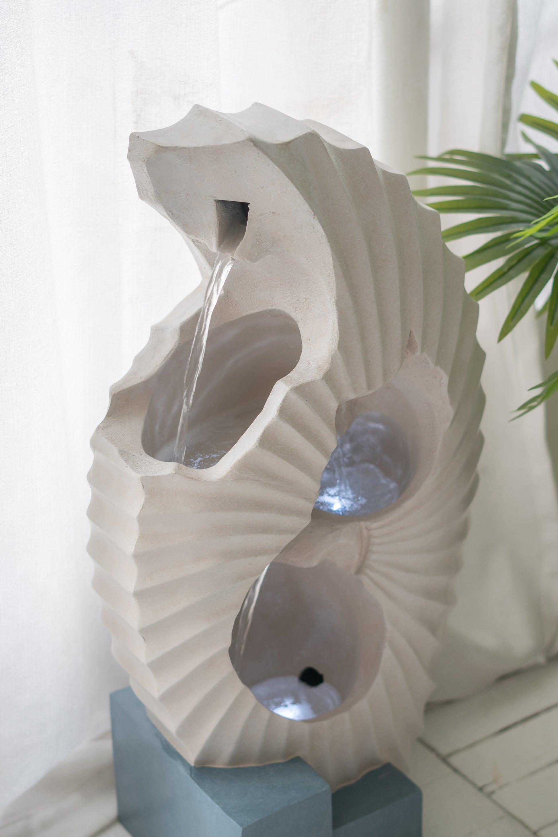 Modern spiral garden fountain with soothing water flow and LED lighting