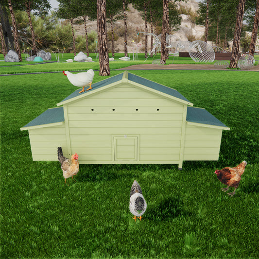 Light green wooden chicken coop with dark green roof and four chickens on grass