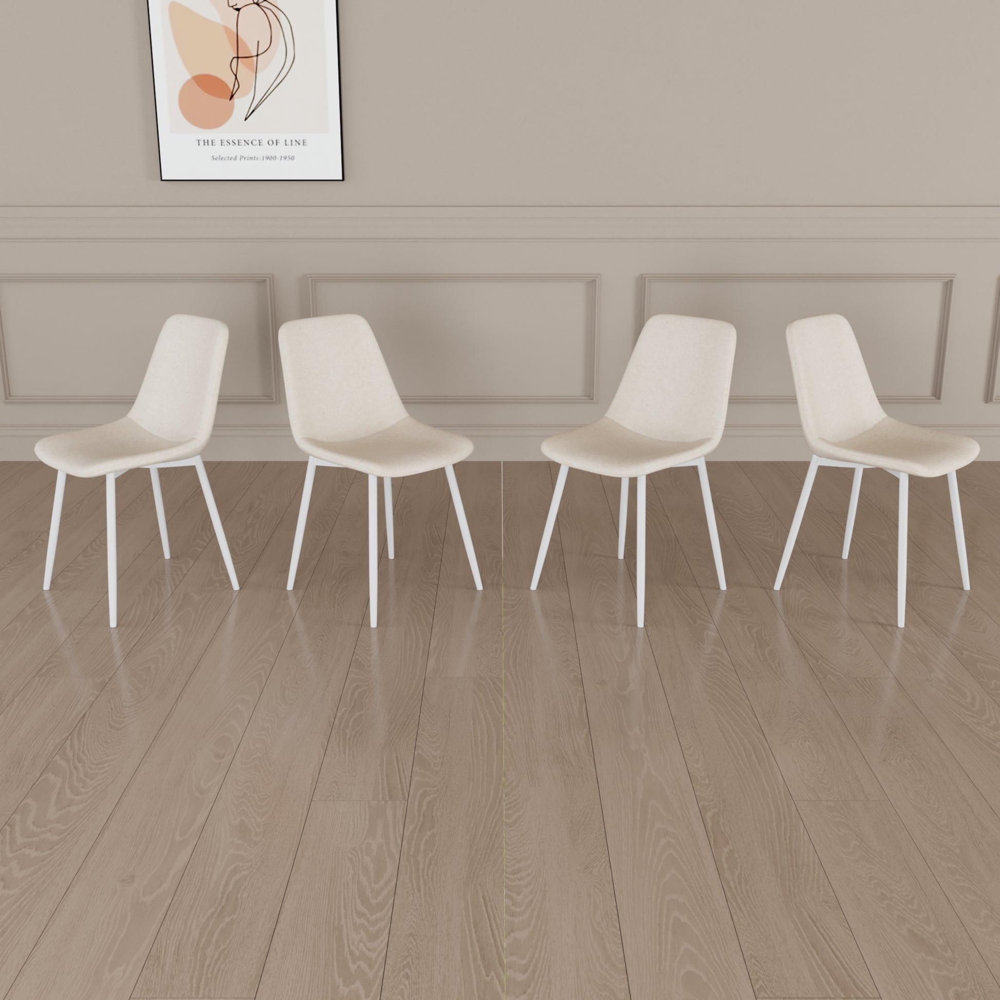 Four cream upholstered dining chairs with white metal legs set in a modern dining room