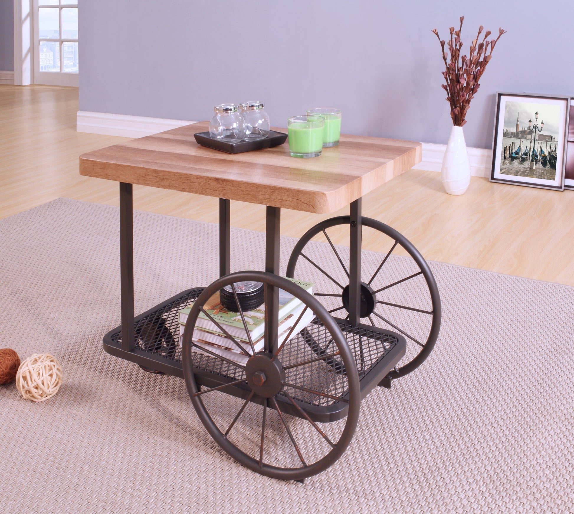 Wooden coffee table with industrial cart wheel accents and metal mesh shelf