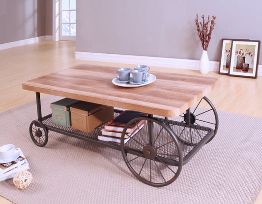 Rustic wooden coffee table with industrial metal wheels and storage shelf