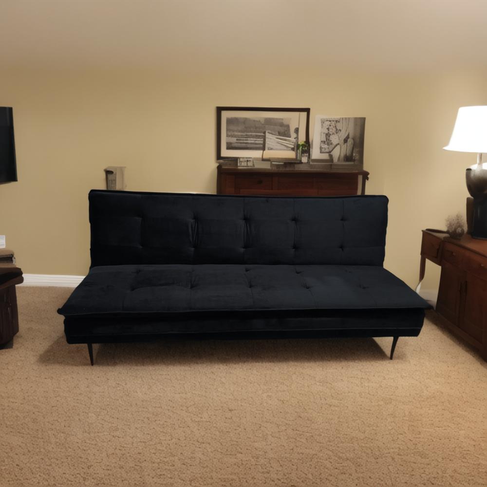 Tufted black velvet sofa bed with modern design perfect for small spaces