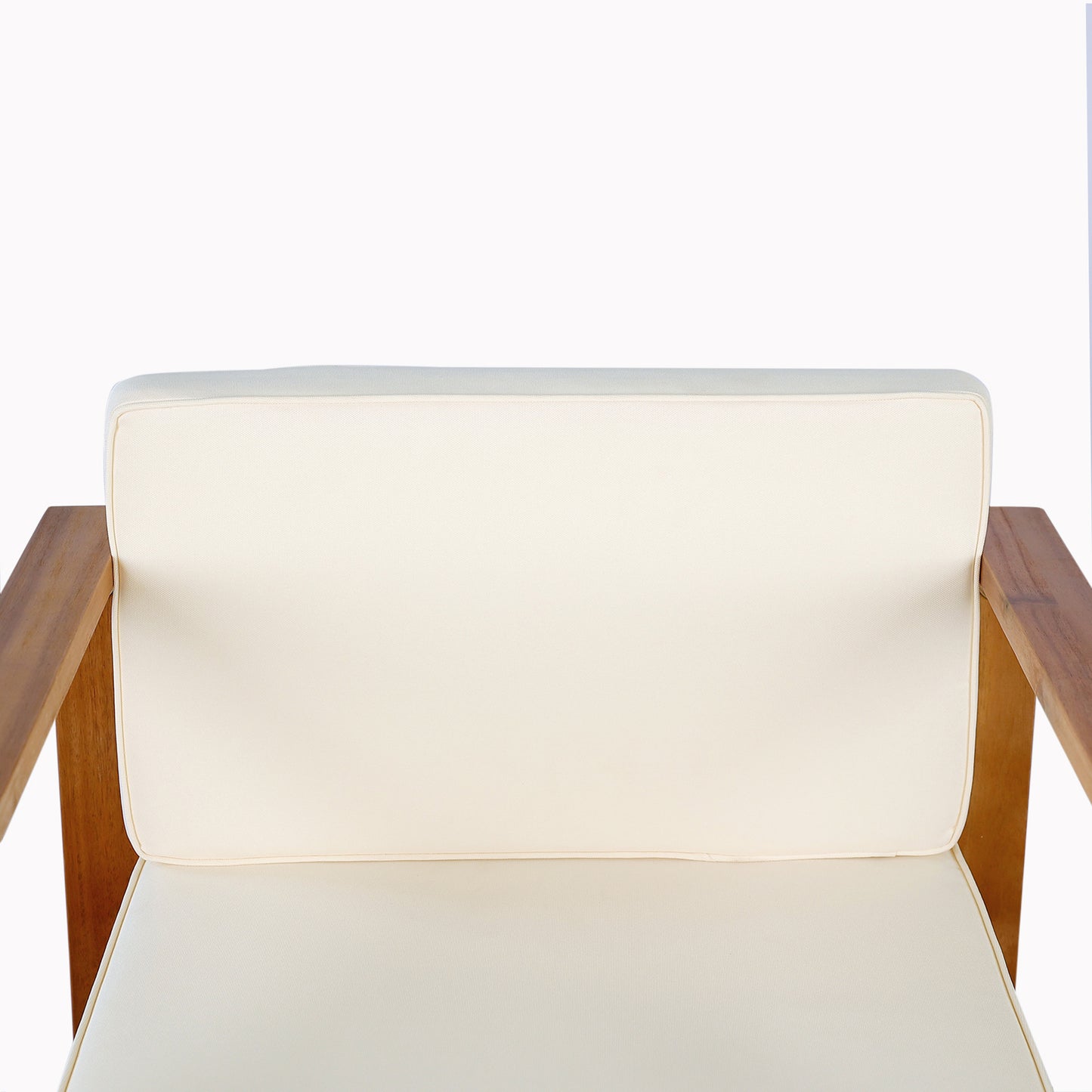 Cream cushioned armchair with solid wood frame ideal for patio furniture