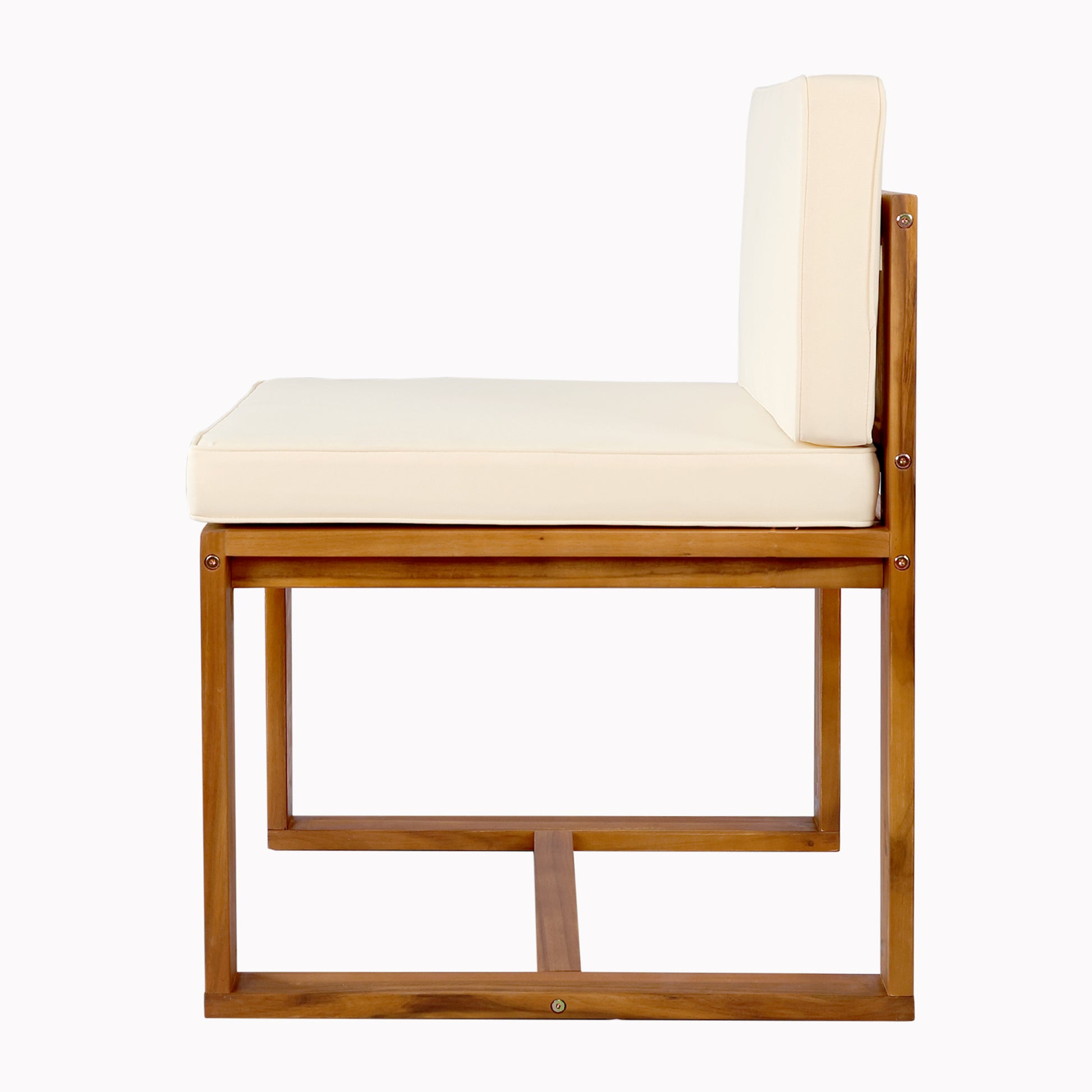 Side view of a modern wooden bench with a cream cushion and sturdy frame