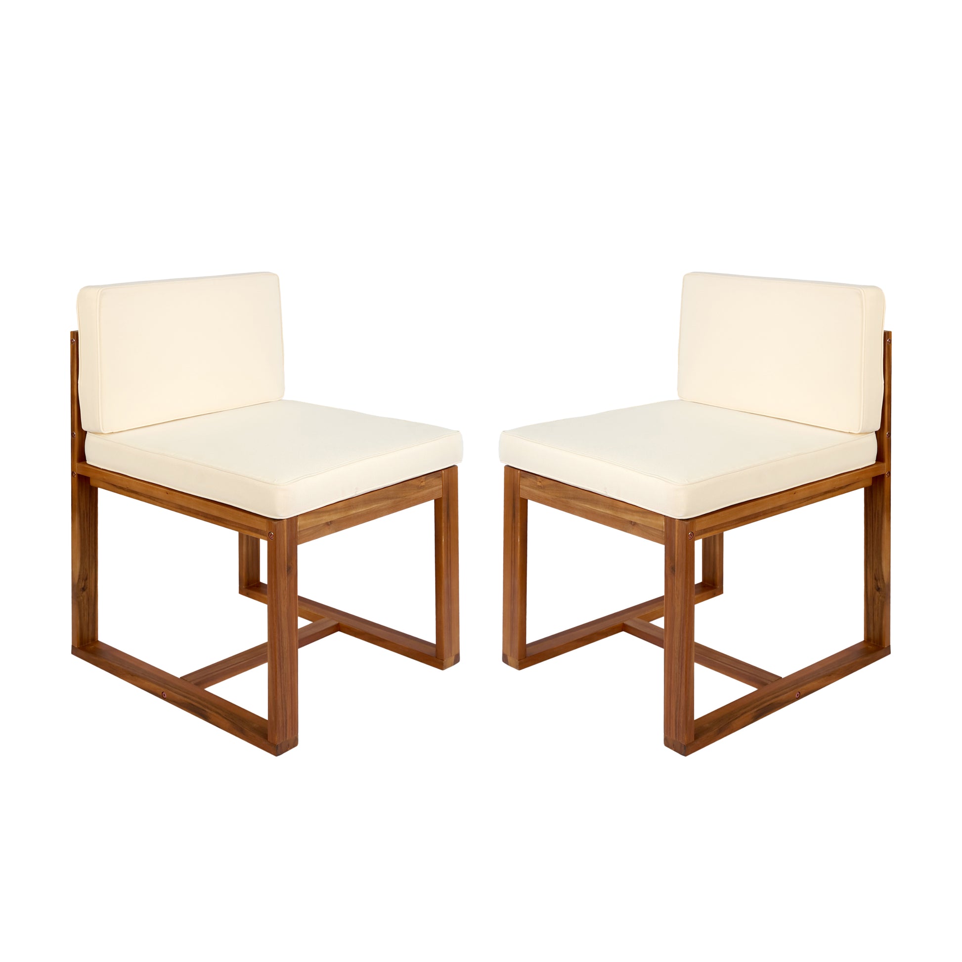 Two modern wooden armless chairs with cream cushions for outdoor lounging