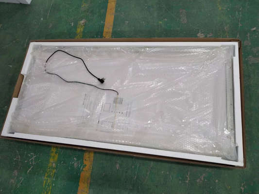 Flat panel display in box with bubble wrap and attached power cord