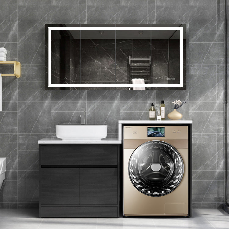 Modern gold frontload washing machine with digital display and intricate drum design