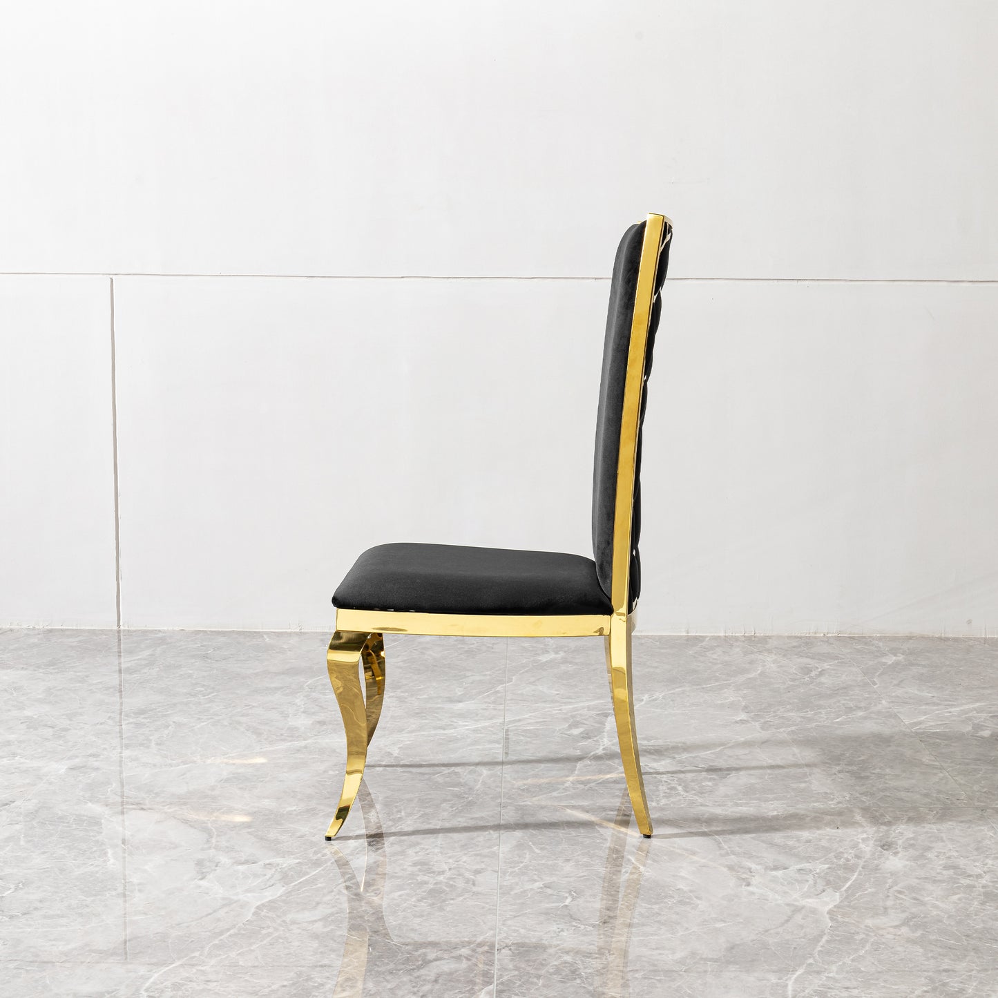 Black velvet dining chair with gold metal legs plush seating