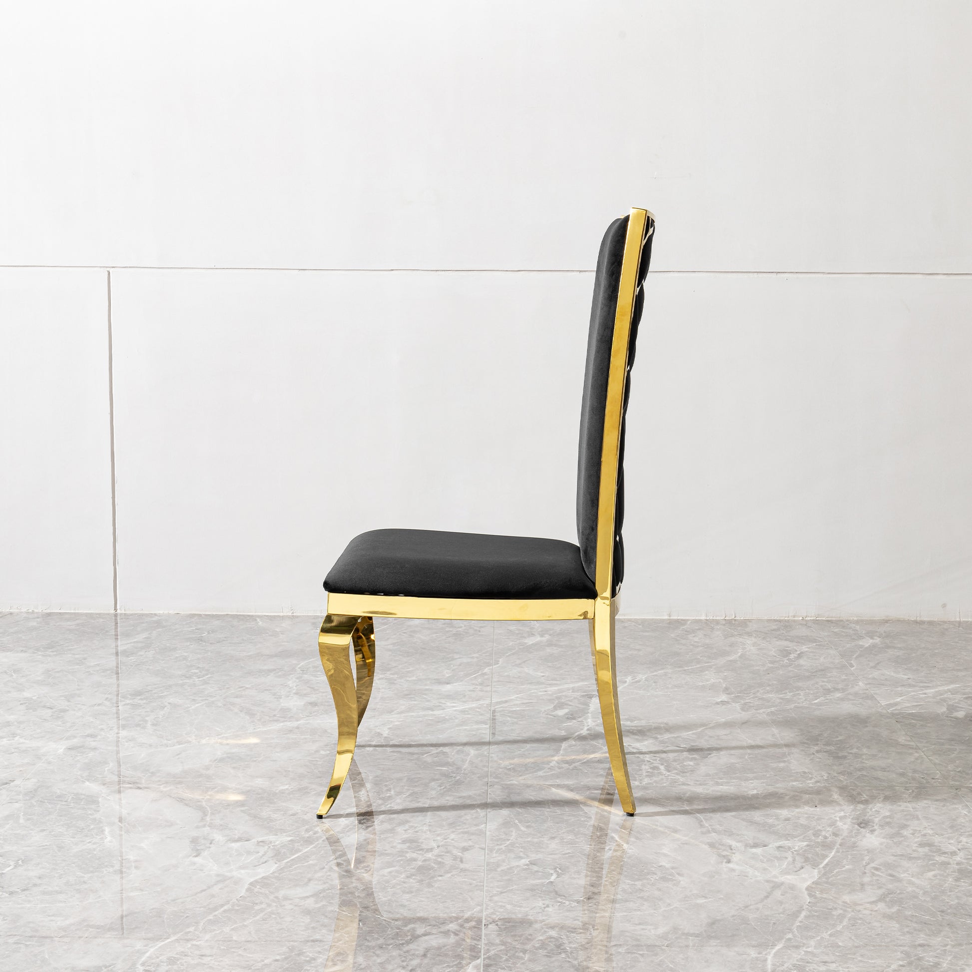Black velvet dining chair with gold metal legs plush seating