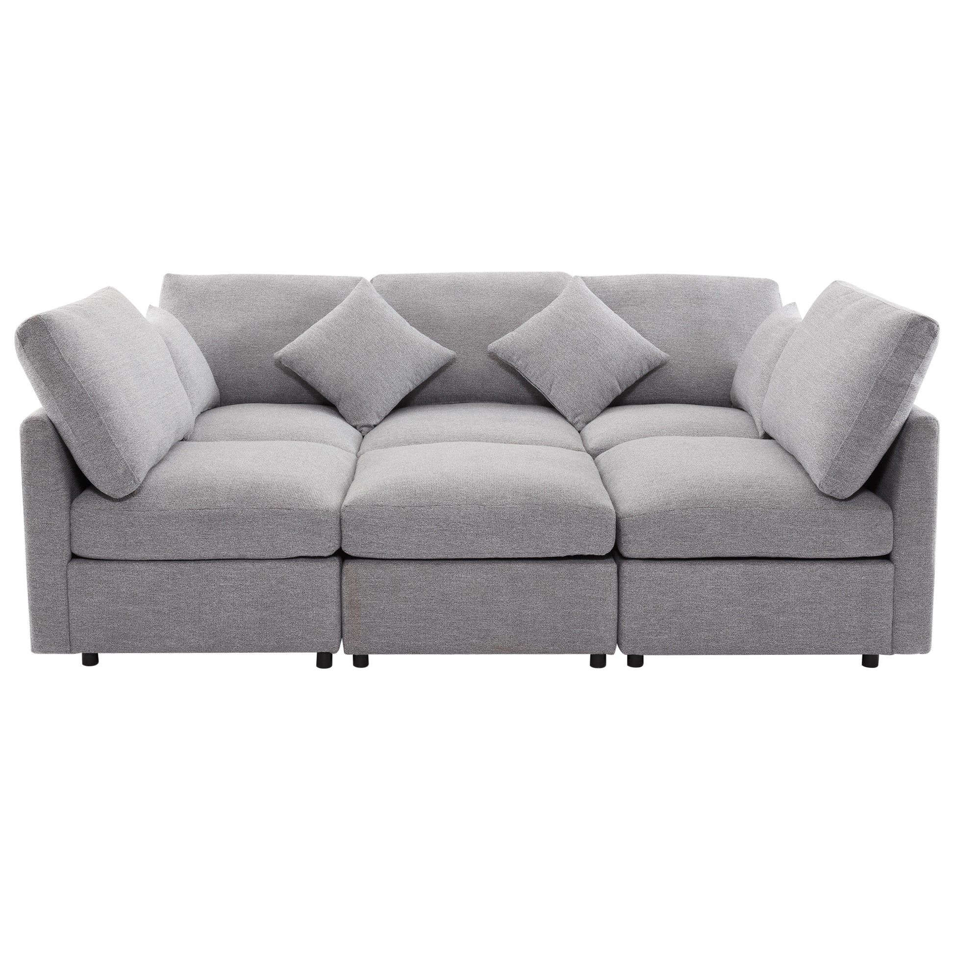 Modular grey fabric sectional sofa with plush throw pillows for modern living rooms