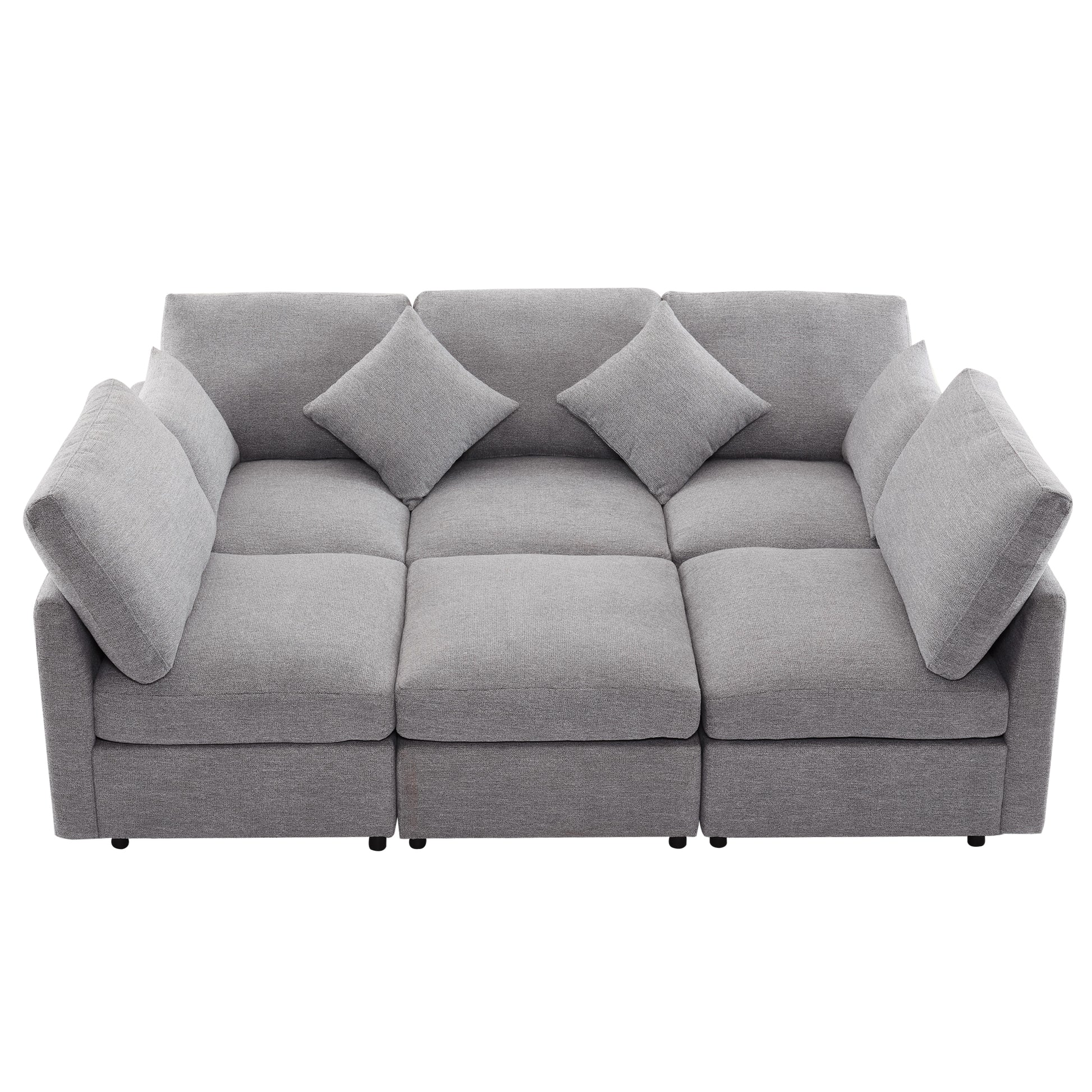 Plush grey fabric sectional sofa with deep seats and plush accent pillows perfect for modern living