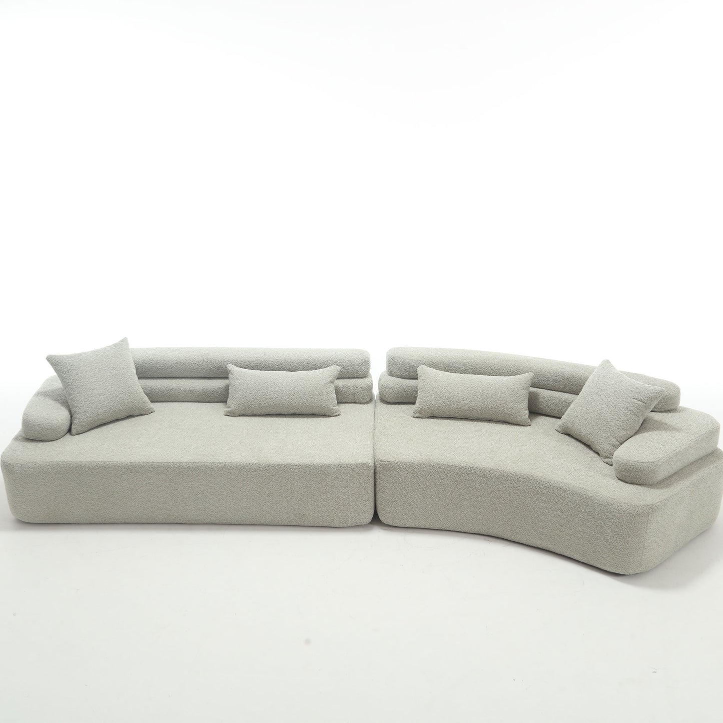 Soft grey textured modular sectional sofa with plush throw pillows for ultimate comfort