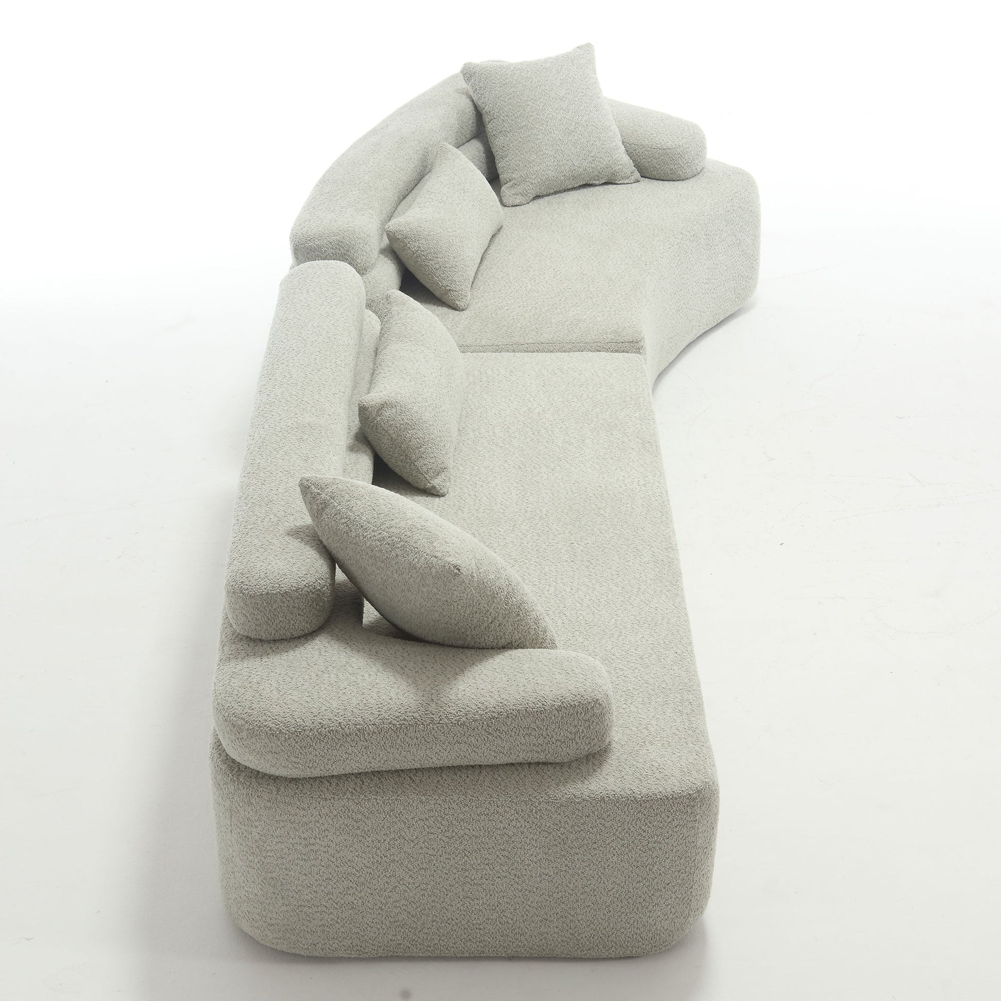 Plush grey boucle modular sectional sofa with multiple cushions for living room comfort
