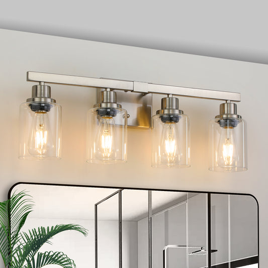 Brushed nickel vanity light with four clear glass shades and Edison bulbs