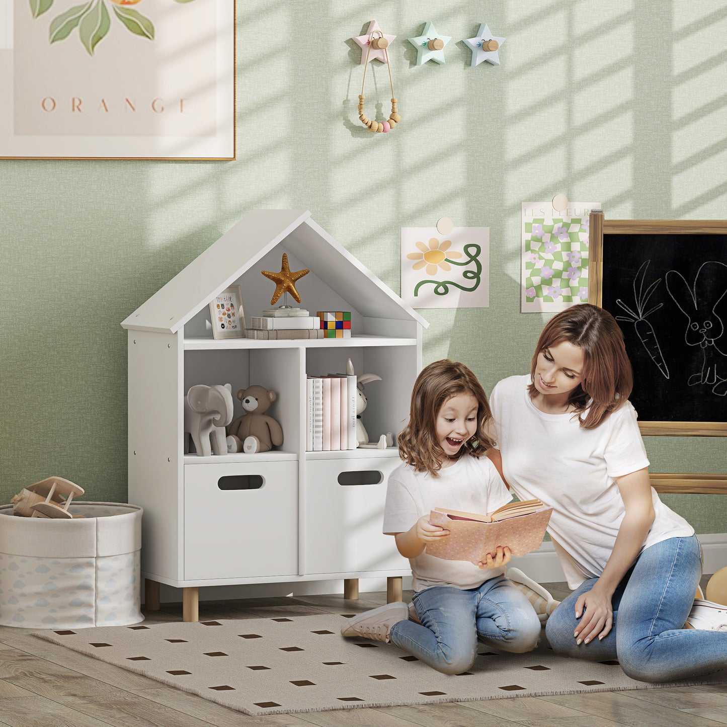 White houseshaped bookshelf with open shelves and drawers for kids room storage