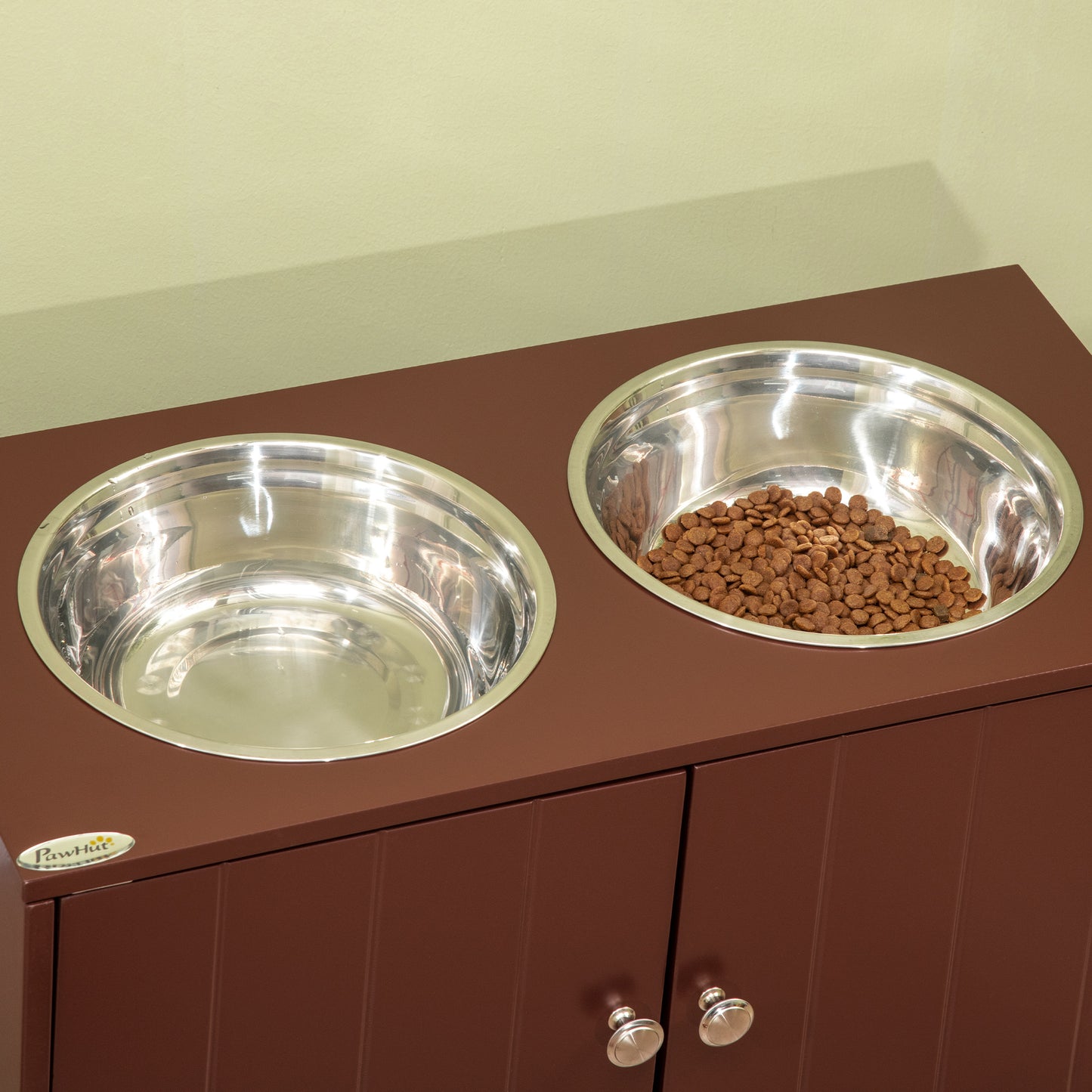 Brown raised dog feeder with two stainless steel bowls one with kibble