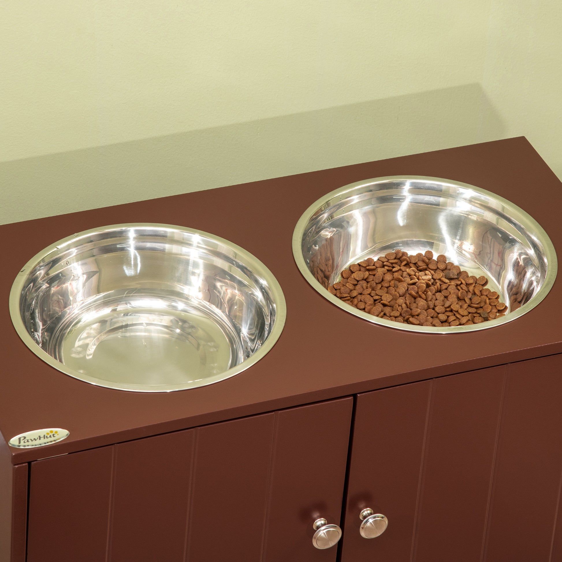 Brown raised dog feeder with two stainless steel bowls one with kibble