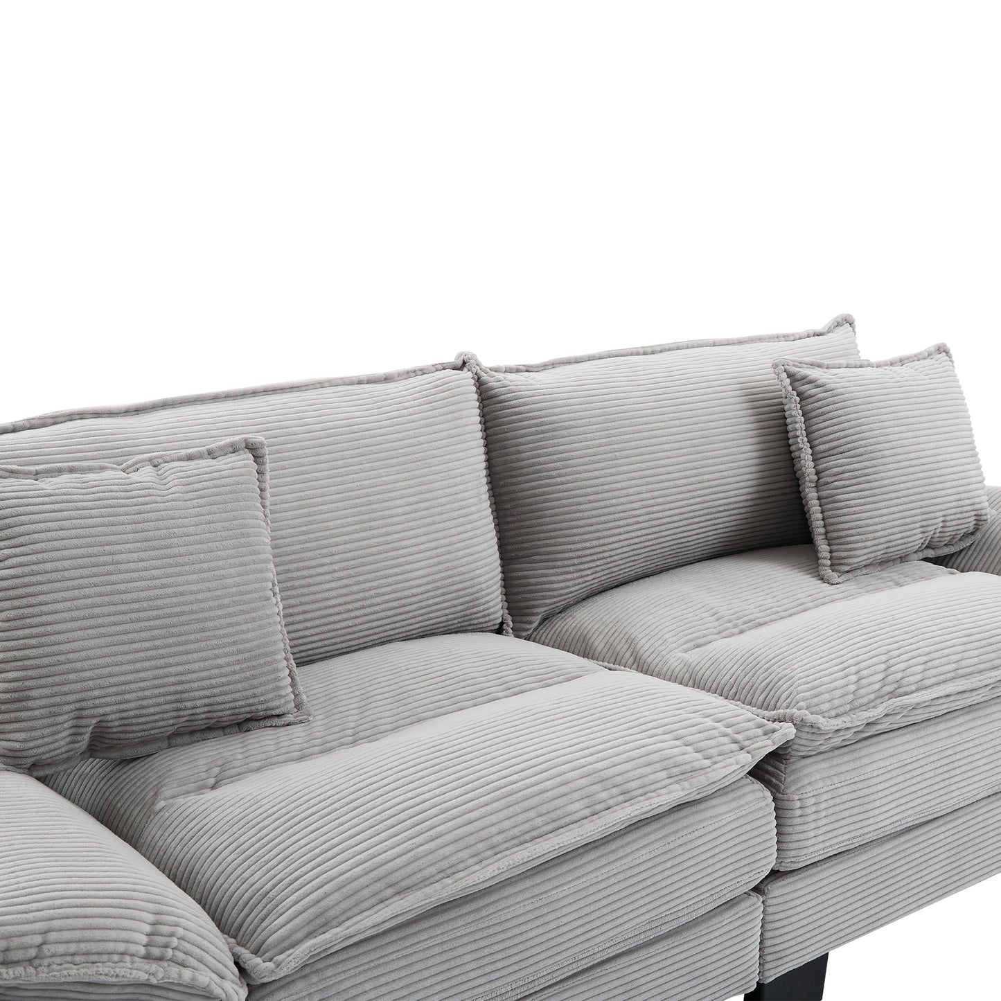 Plush grey corduroy sectional sofa with deep seating and soft throw pillows perfect for a modern living room
