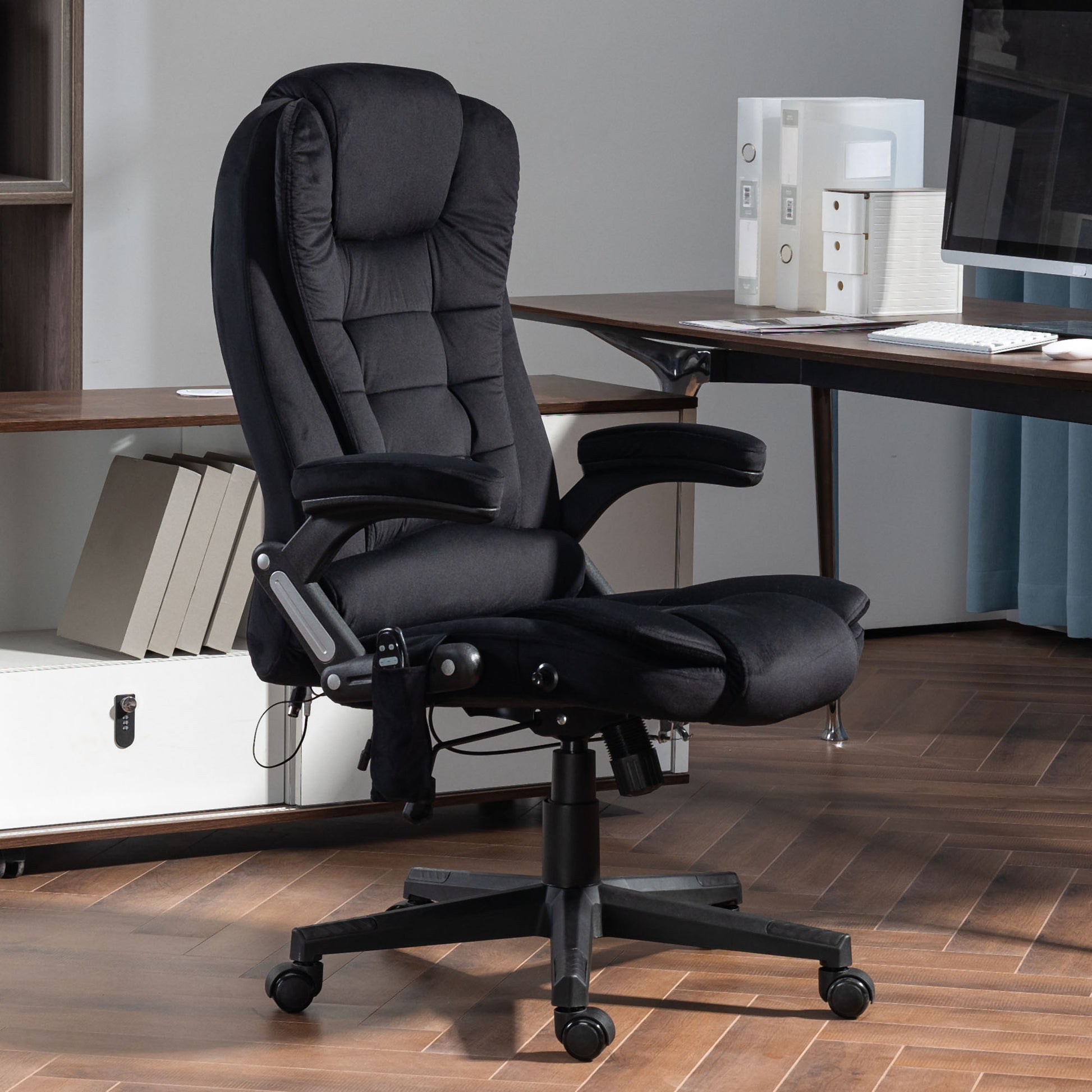 Ergonomic black office chair with plush cushioning and adjustable armrests for comfortable work sessions