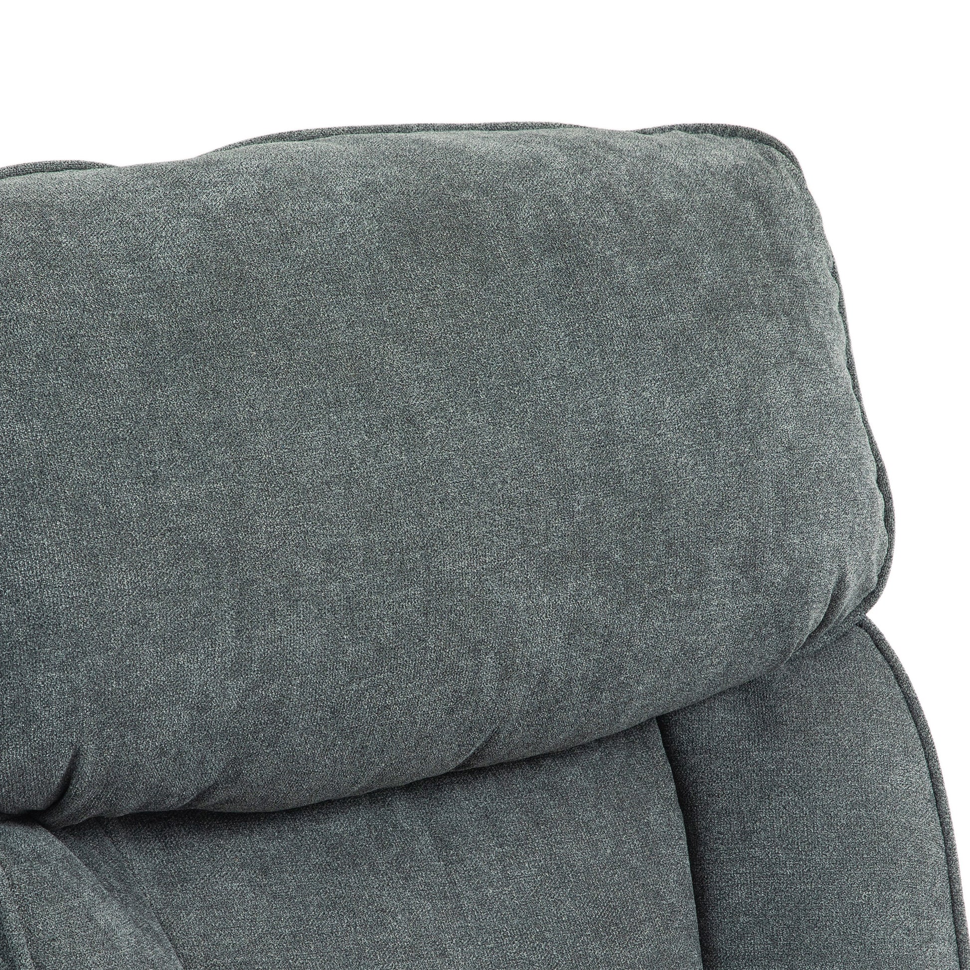 Closeup of plush grey fabric armchair headrest emphasizing texture and comfort