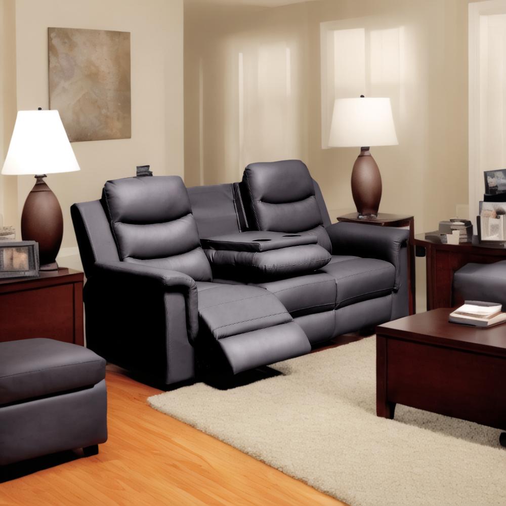Dark gray leather reclining loveseat with cup holders and tray