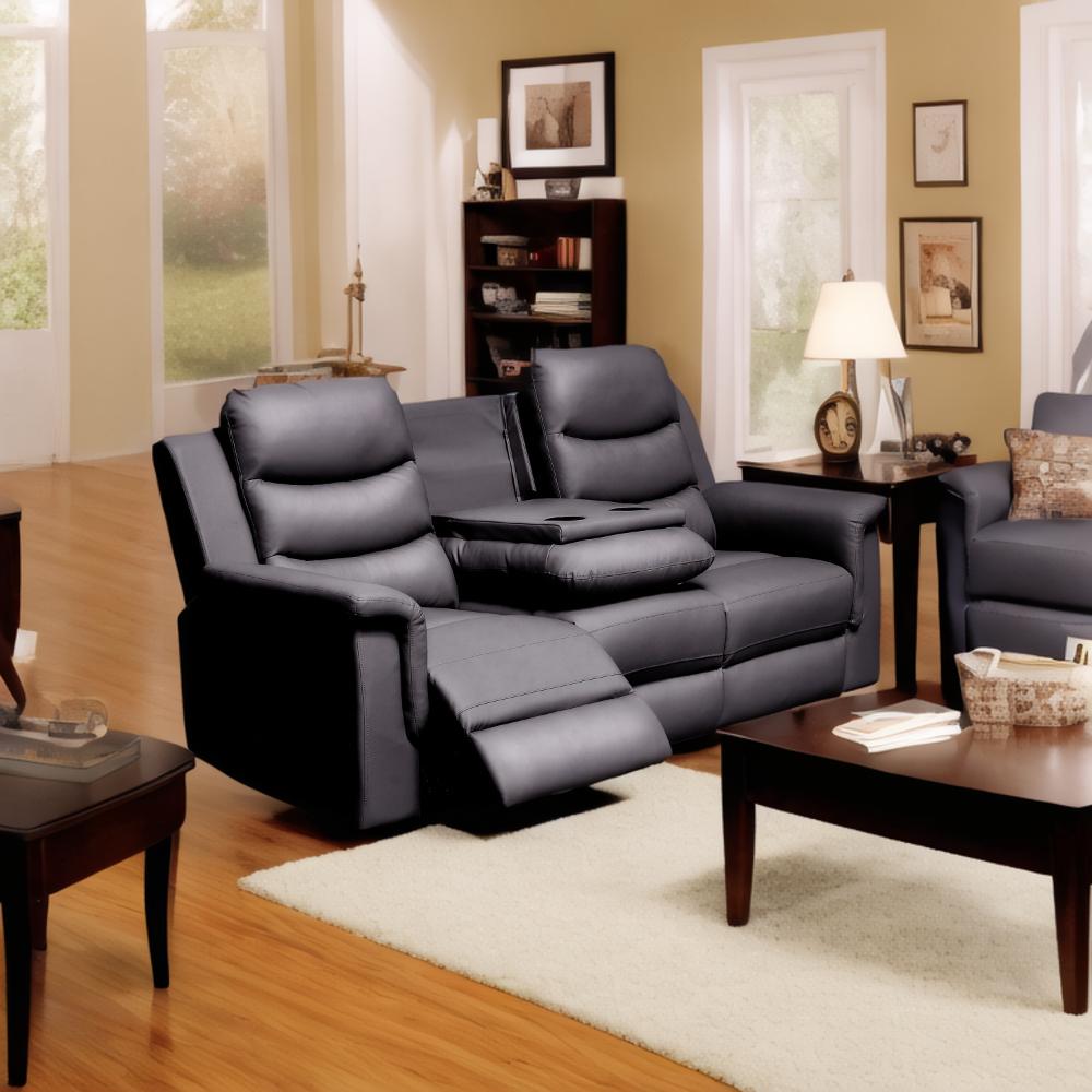 Dark gray leather reclining loveseat with builtin cup holders and center console for ultimate comfort