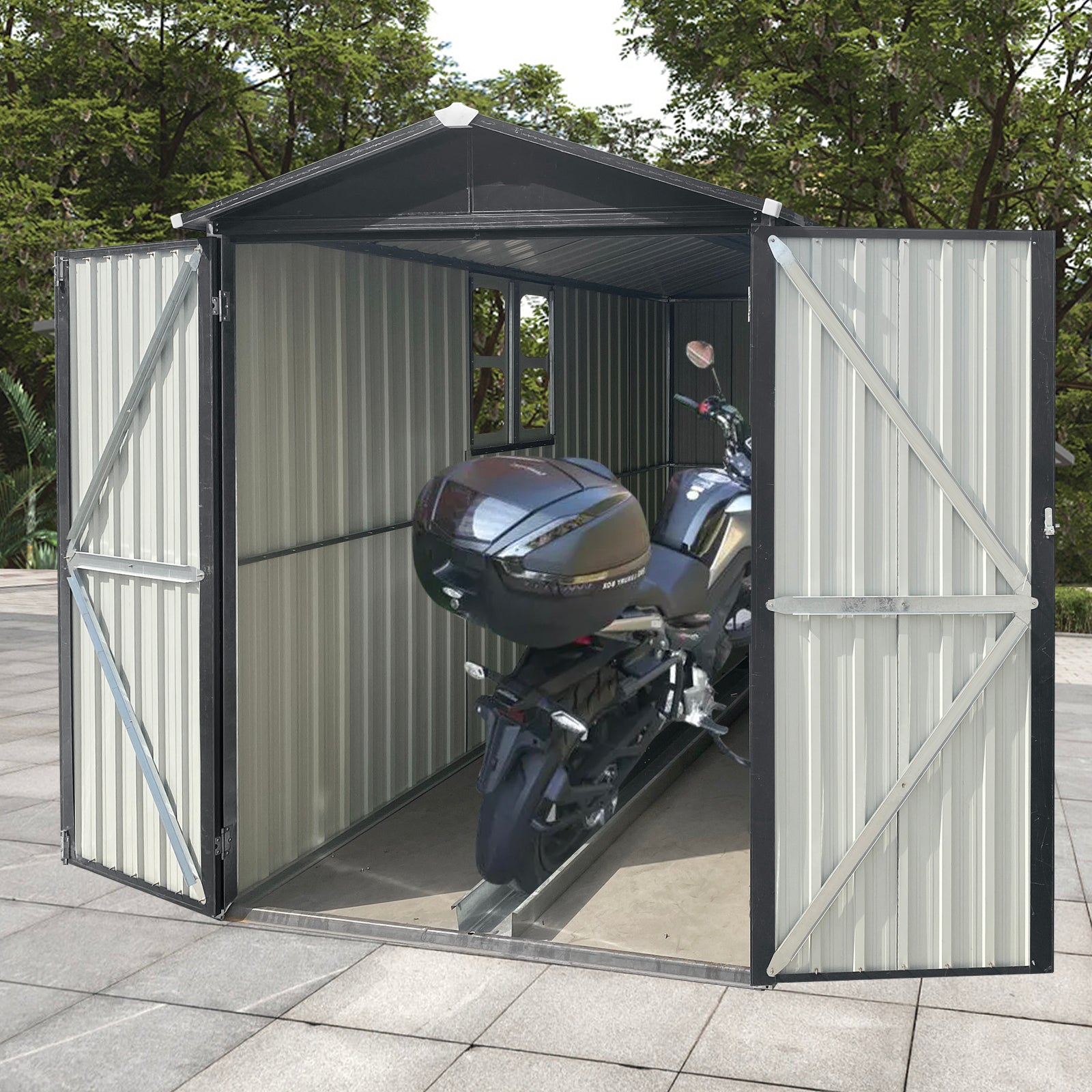 Galvanized steel motorcycle shed with a black roof and double doors open storing a black motorcycle with a large top box