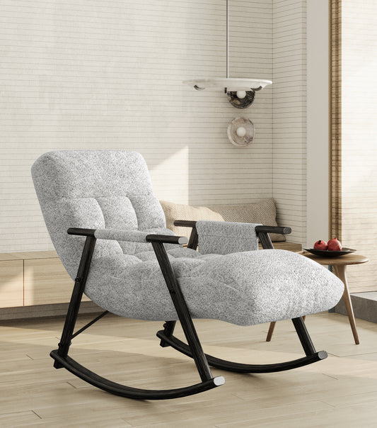 Gray boucle fabric rocking chair with tufted seat and black metal frame
