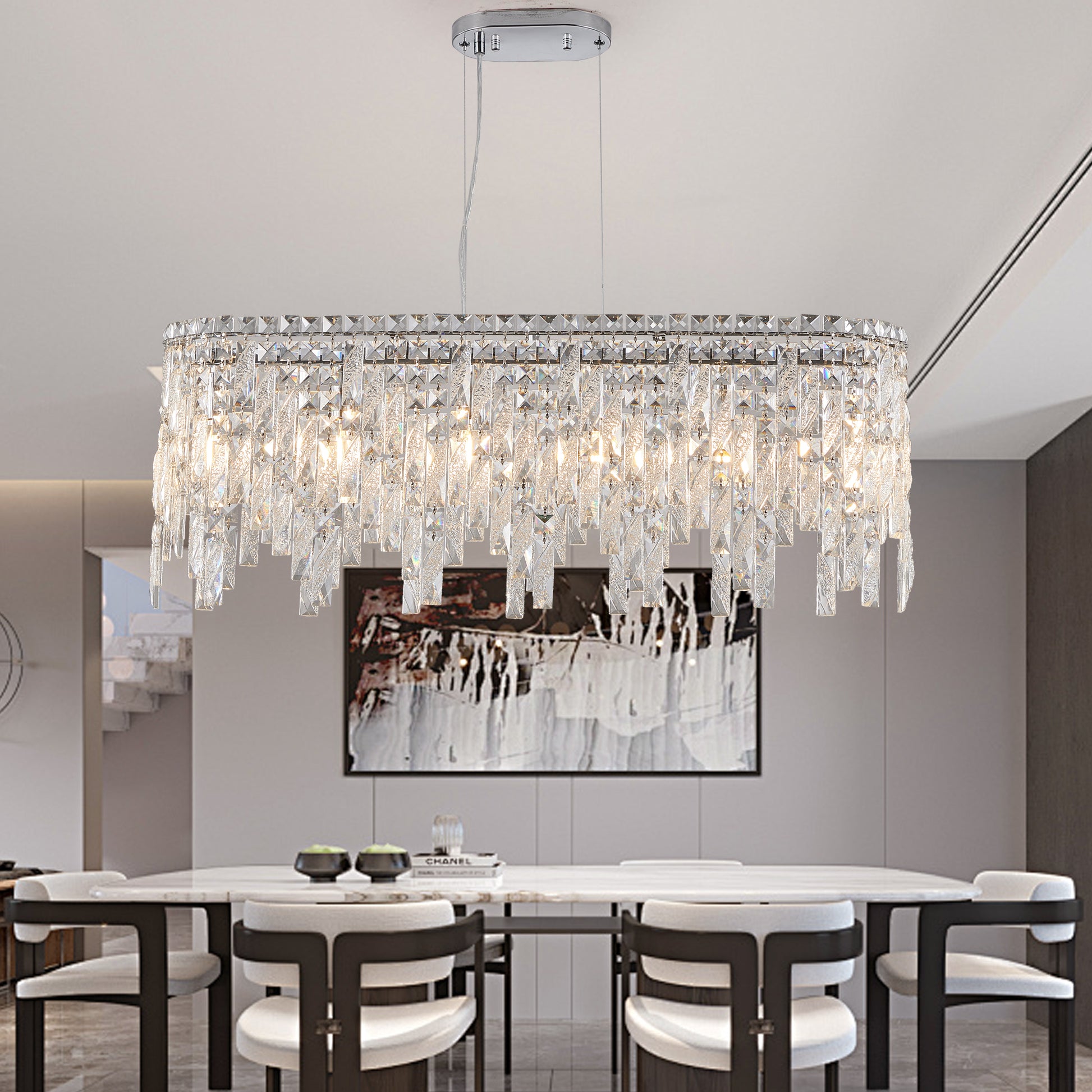 Oval crystal chandelier with cascading prism accents and chrome finish