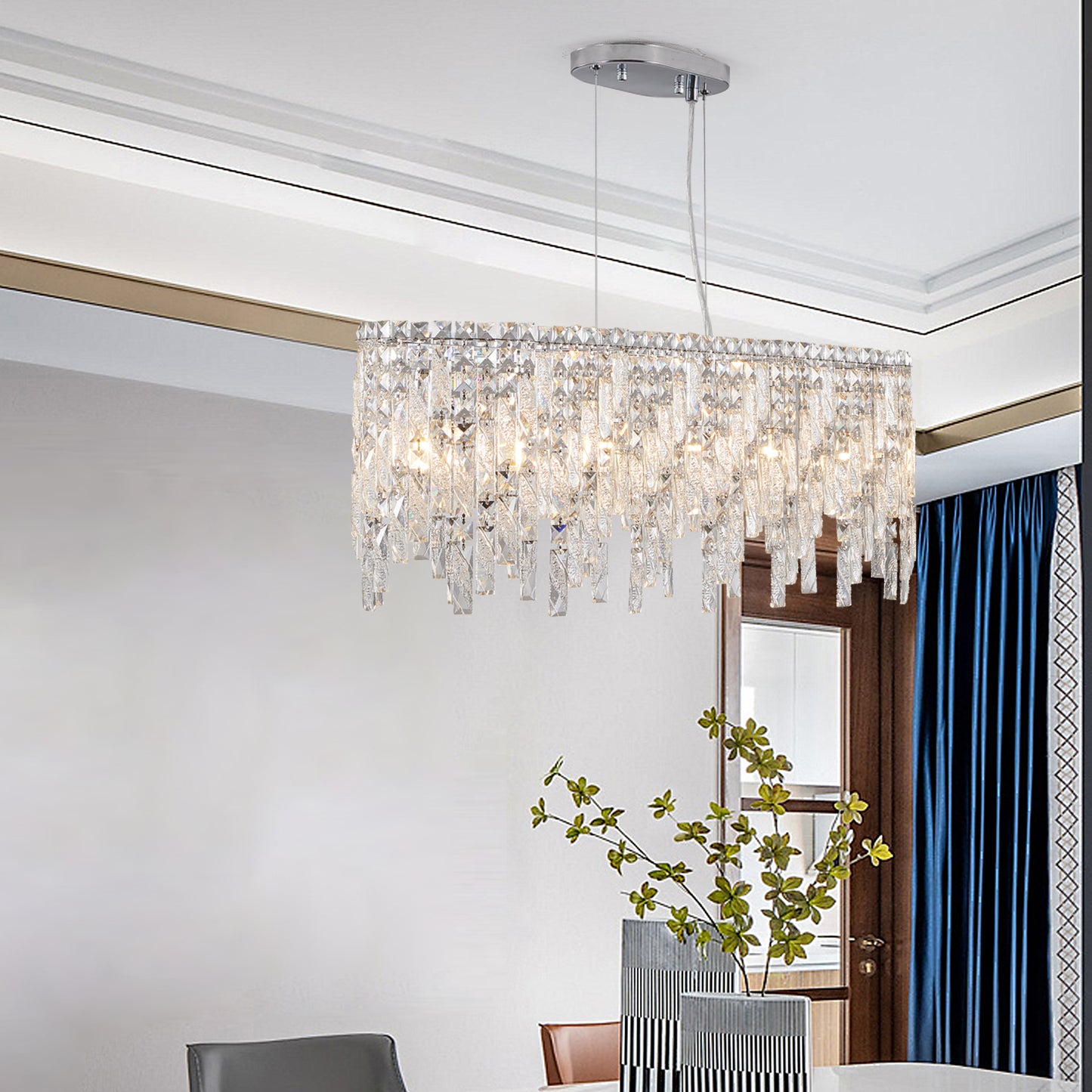 Rectangular crystal chandelier with chrome accents and dripping prism details