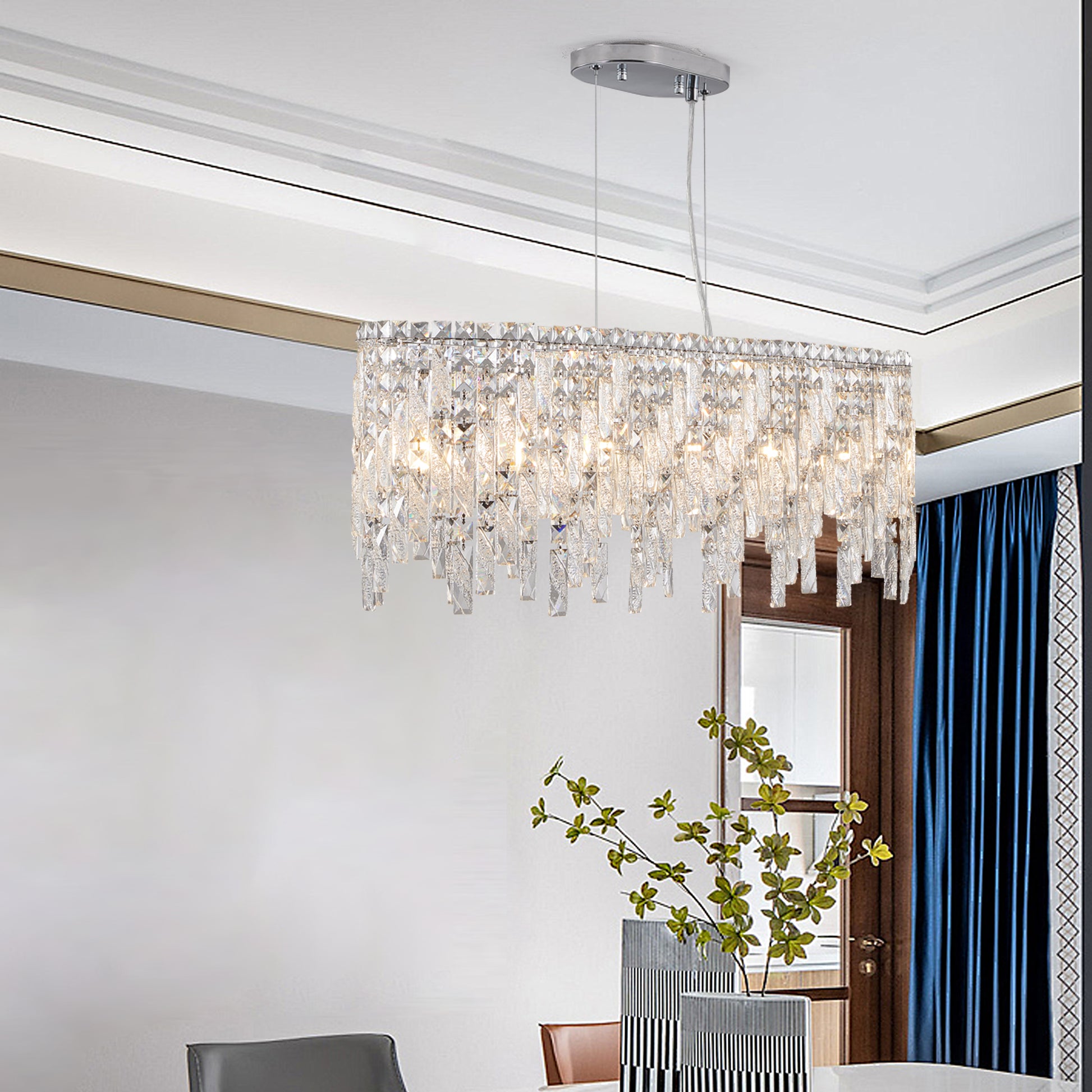 Rectangular crystal chandelier with chrome accents and dripping prism details