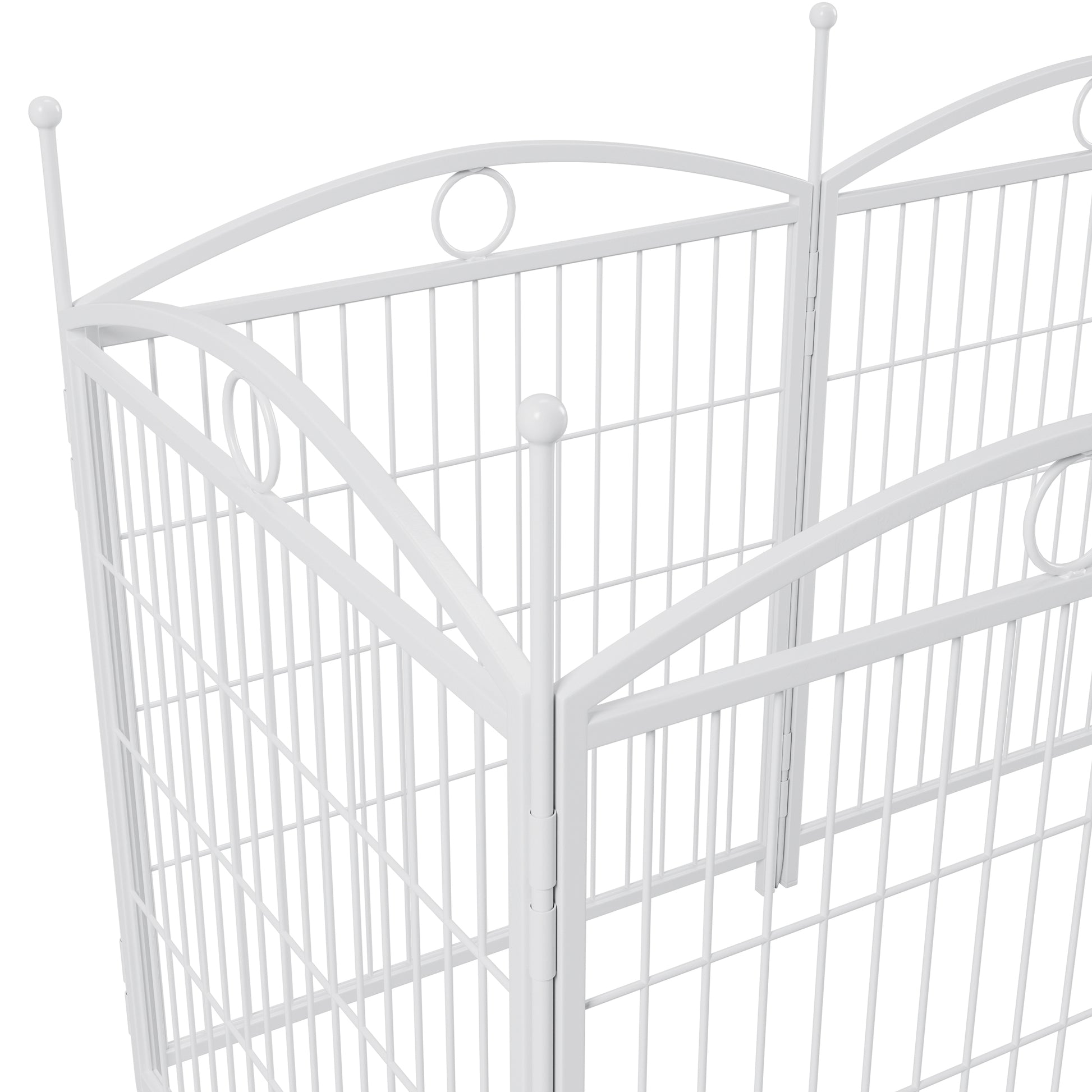 White metal dog playpen with decorative finials and arched top bars