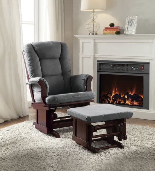 Comfortable grey upholstered glider chair with matching ottoman on a plush rug