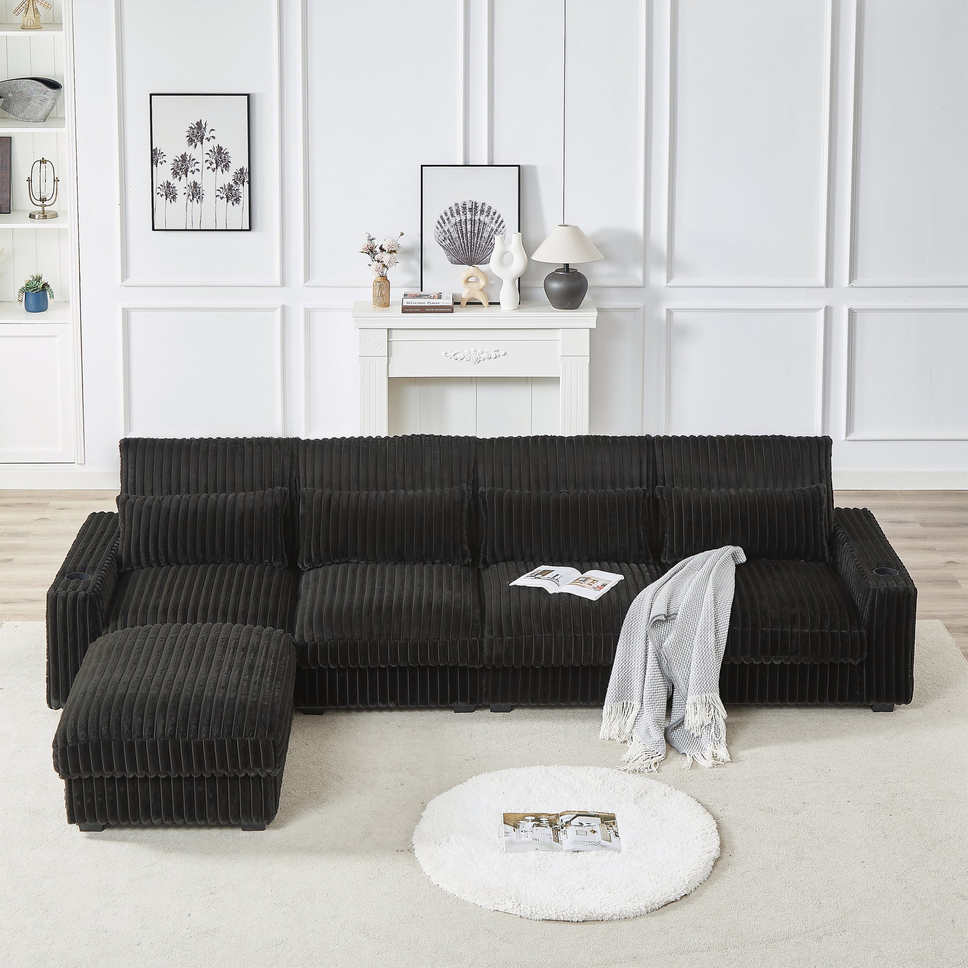 Dark charcoal corduroy sectional sofa with ottoman and cup holders