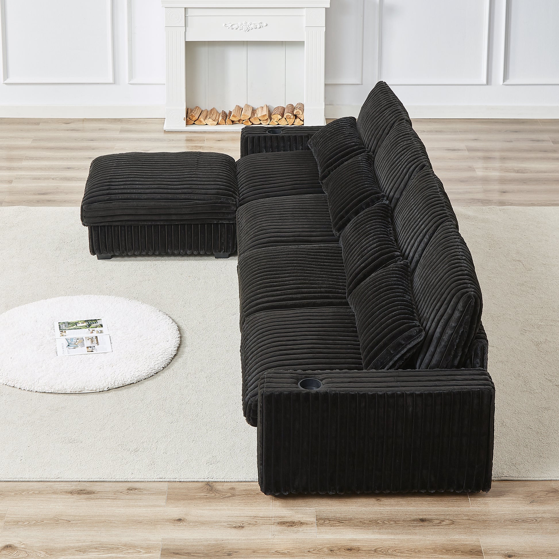 Black corduroy sectional sofa with ottoman and builtin cup holders modern style