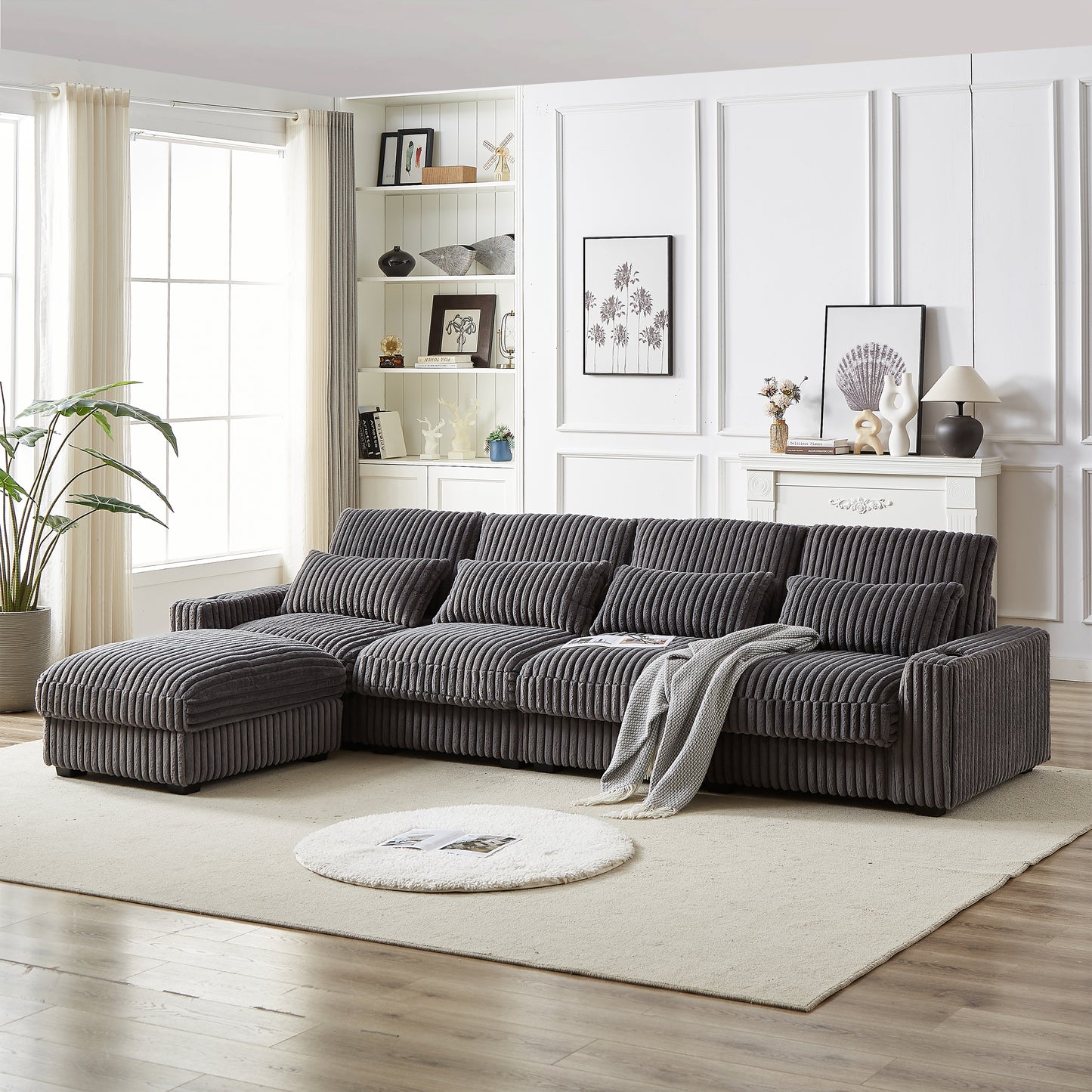 Dark gray corduroy sectional sofa with chaise and ottoman modern living room style