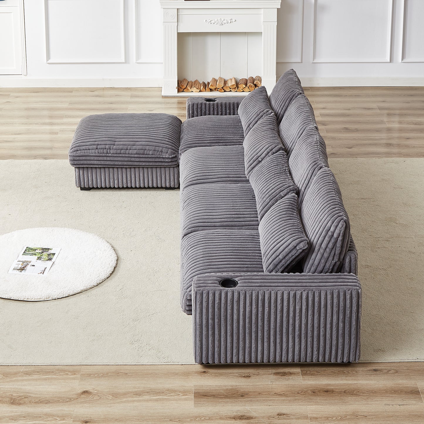 Plush grey corduroy sectional sofa with integrated cup holders for modern living