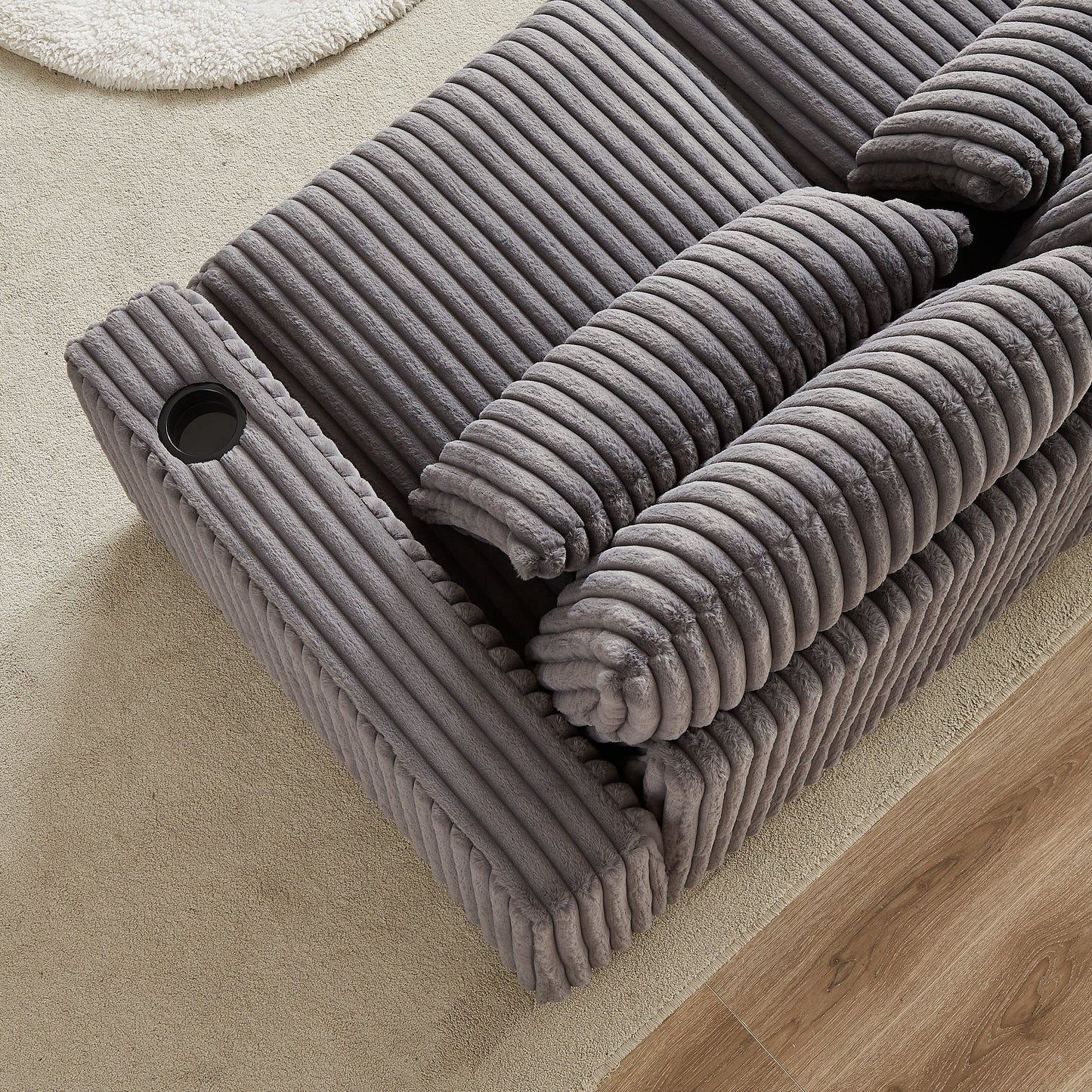 Plush grey corduroy ottoman with builtin cup holder perfect for living room relaxation
