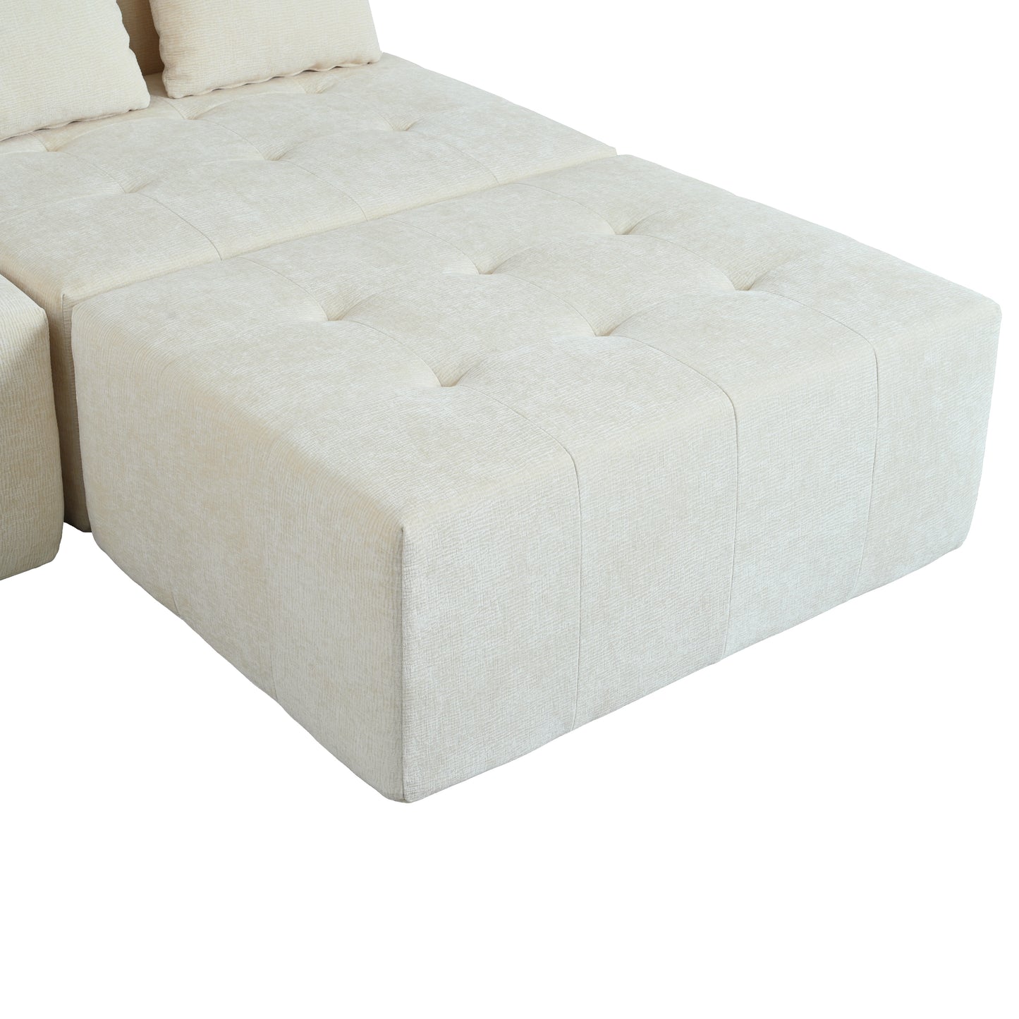 Tufted cream fabric ottoman for a modern living room