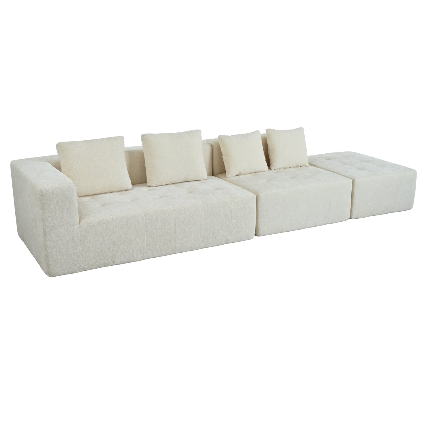 Cream textured sectional sofa with plush throw pillows and a modular ottoman