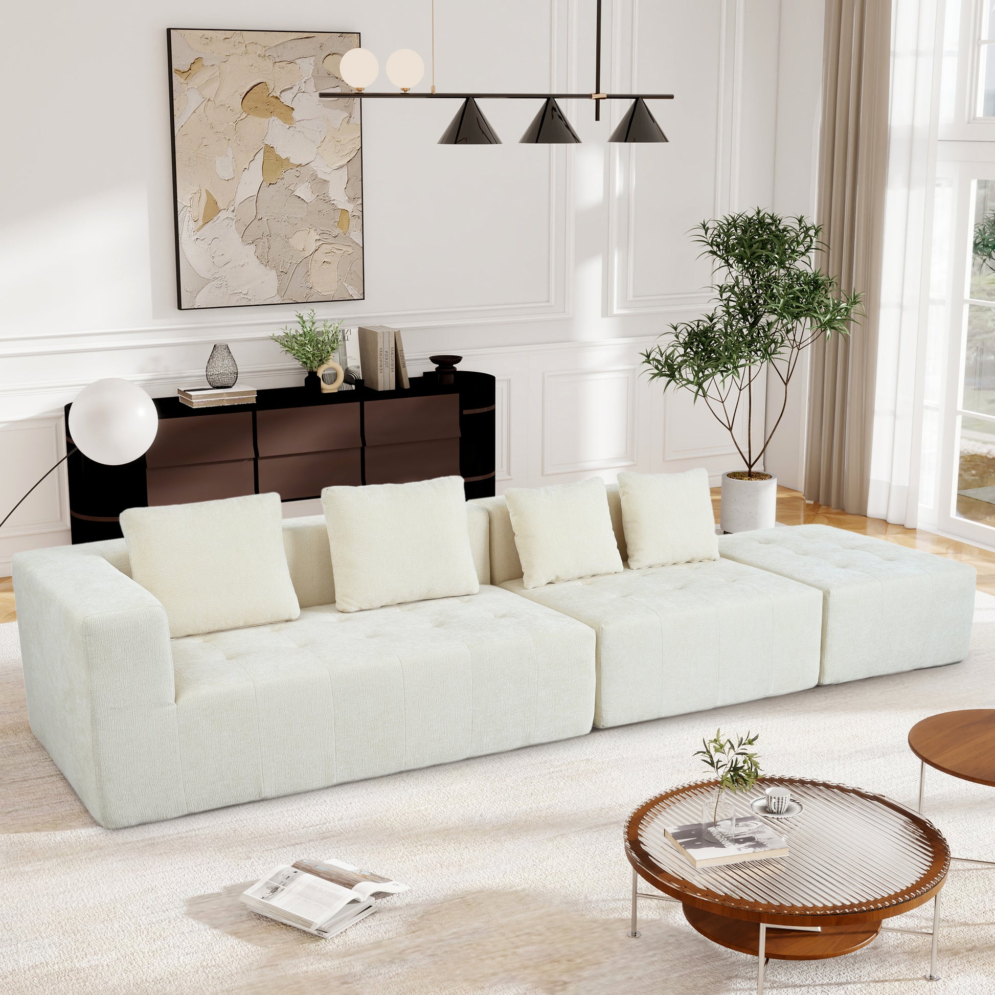 Plush cream modular sectional sofa with tufted cushions for a comfortable living room setup