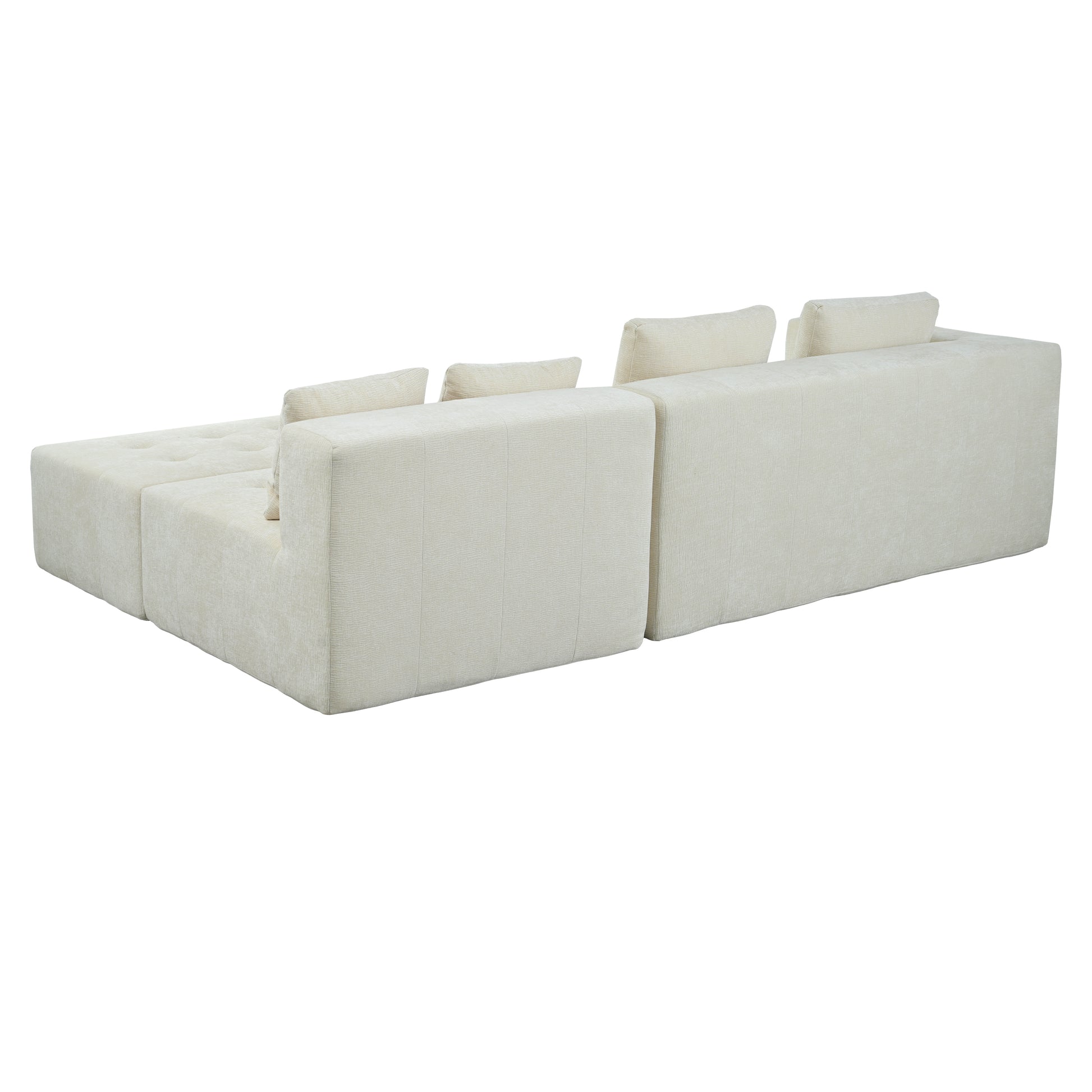 Cream sectional sofa with plush fabric and tufted back cushions
