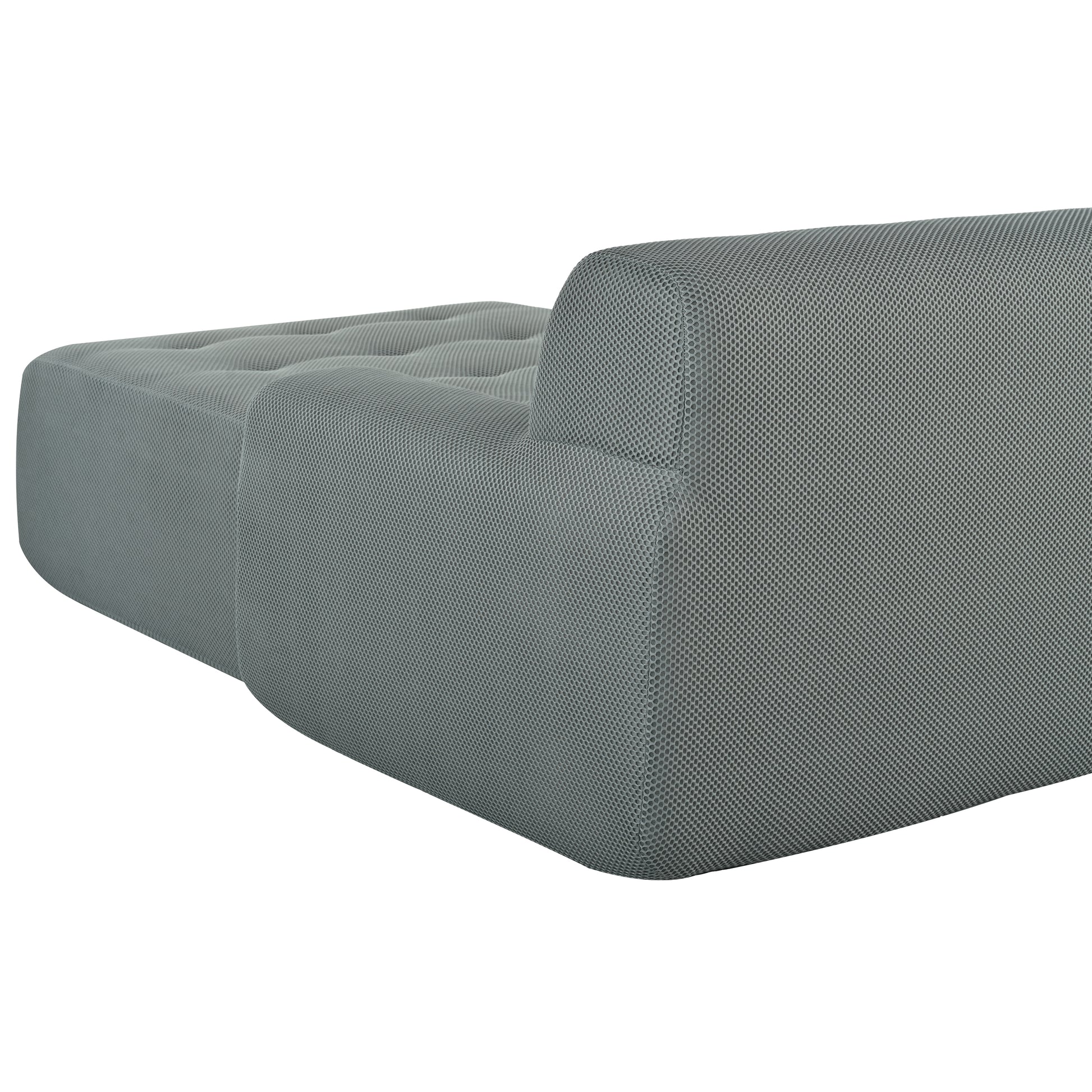 Tufted grey fabric ottoman with textured weave for versatile seating