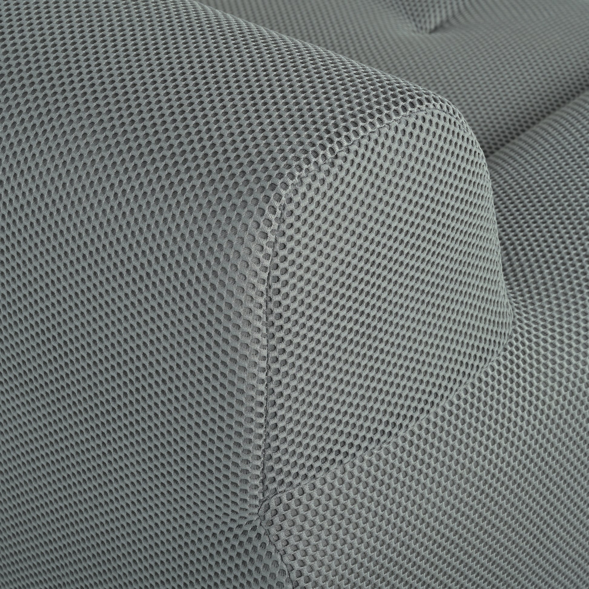 Closeup of a grey breathable mesh fabric with a distinctive hexagonal pattern ideal for upholstery