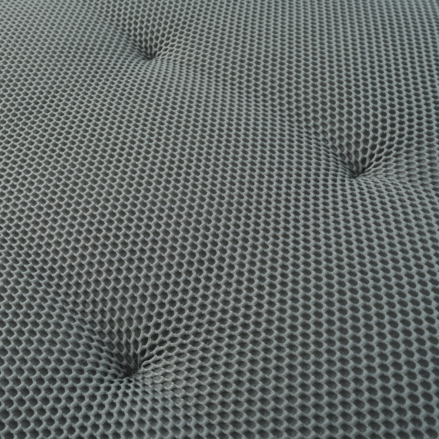 Gray hexagonal mesh fabric with tufted accents ideal for upholstery or bedding